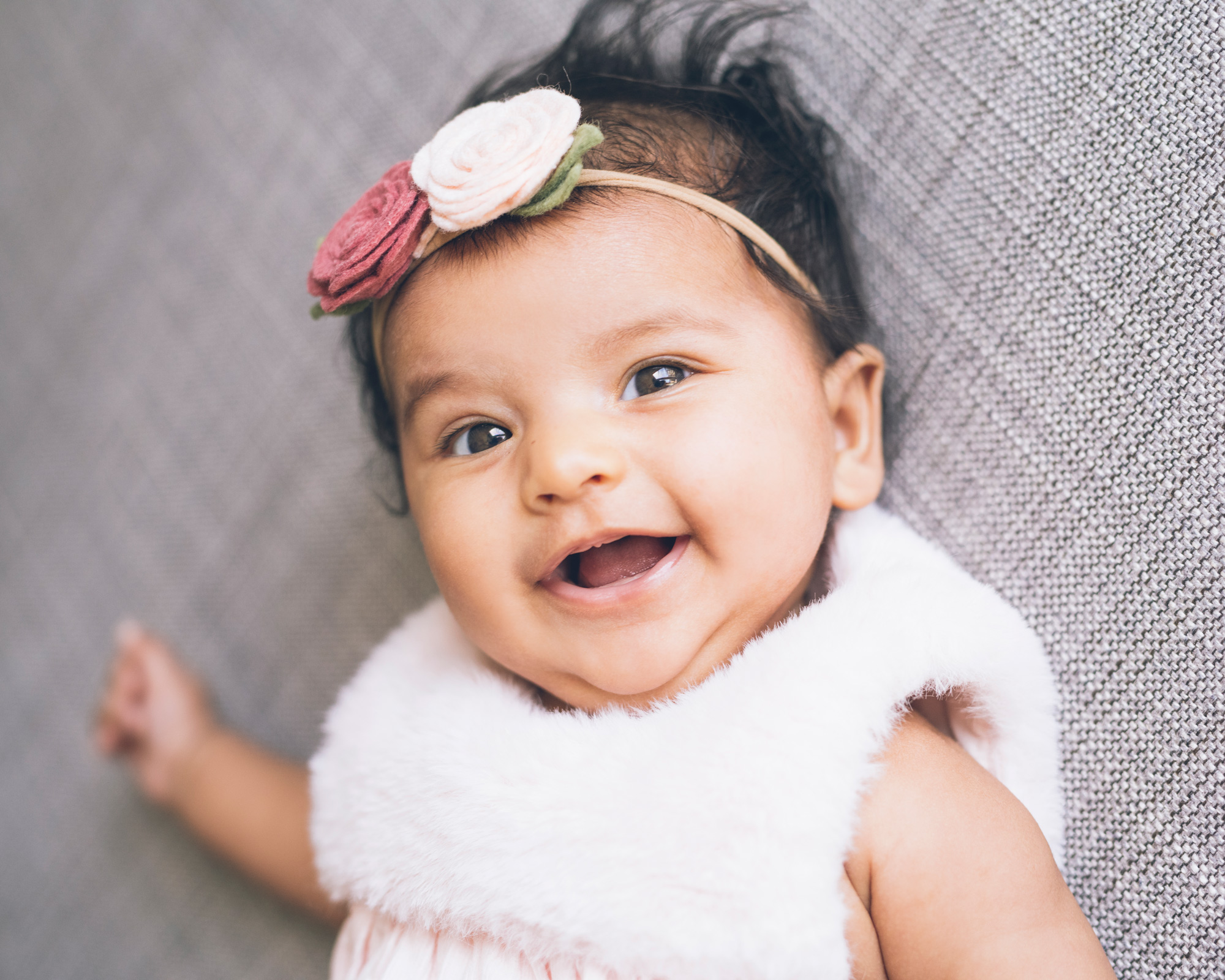 portrait-of-a-three-month-old-baby-girl-smiling.jpg