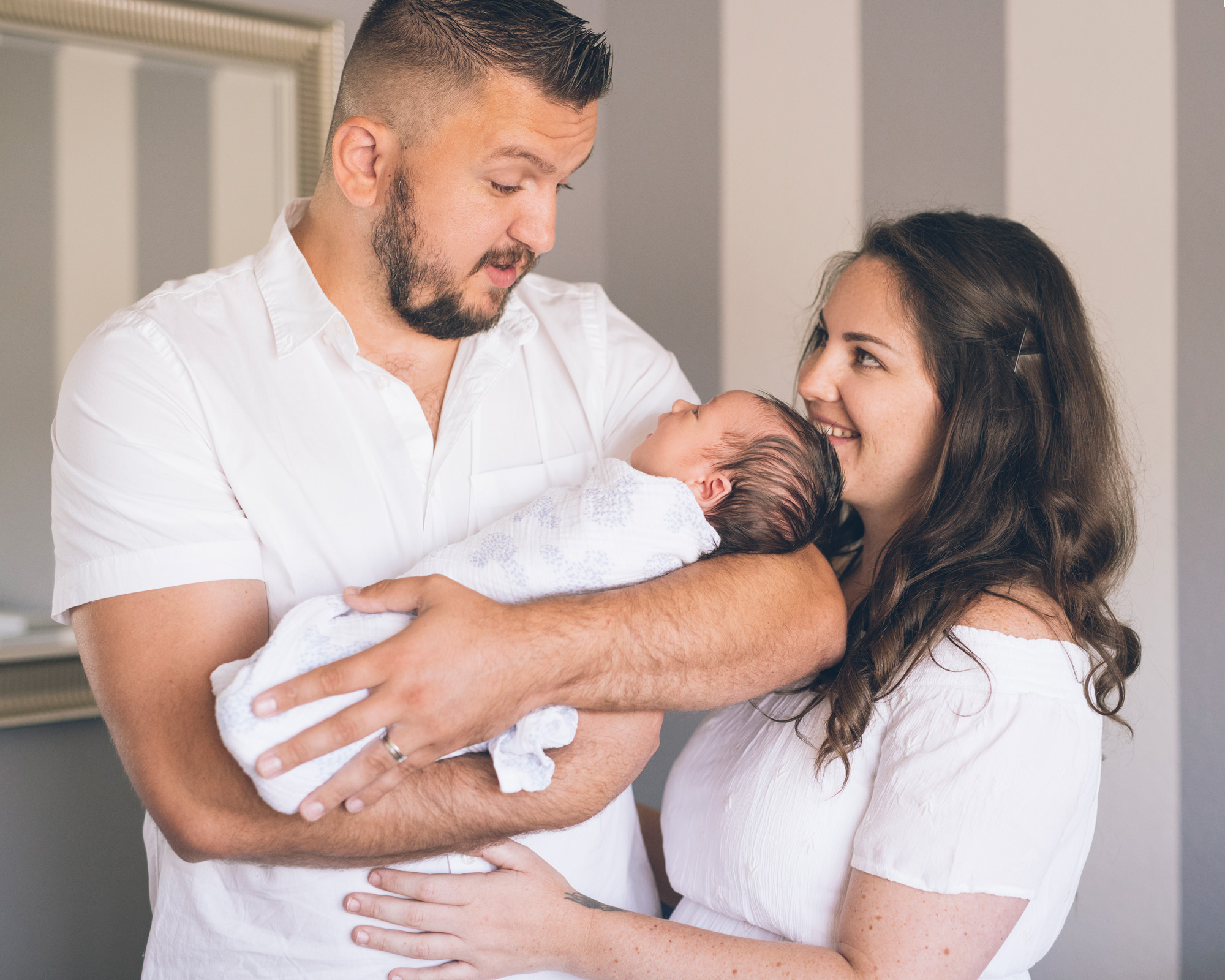 parents-holding-newborn-baby-boy.jpg