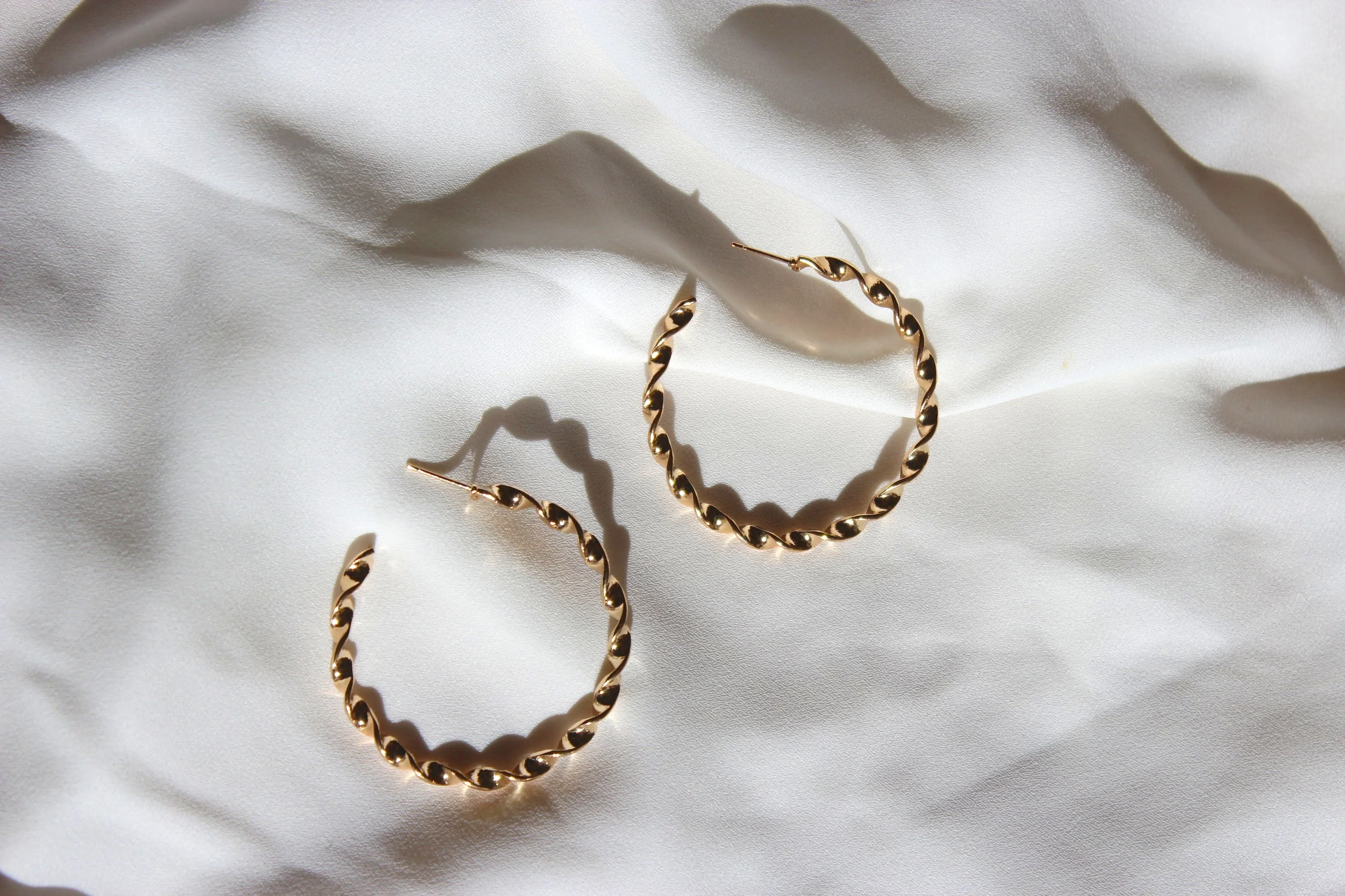 twisted+gold+hoops.jpg