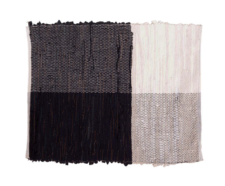 In 2017 we used scrap materials from the Jump Suit project by Rational Dress Society . We processed the black and white material into strips that were woven by individual participants into meditation mats.