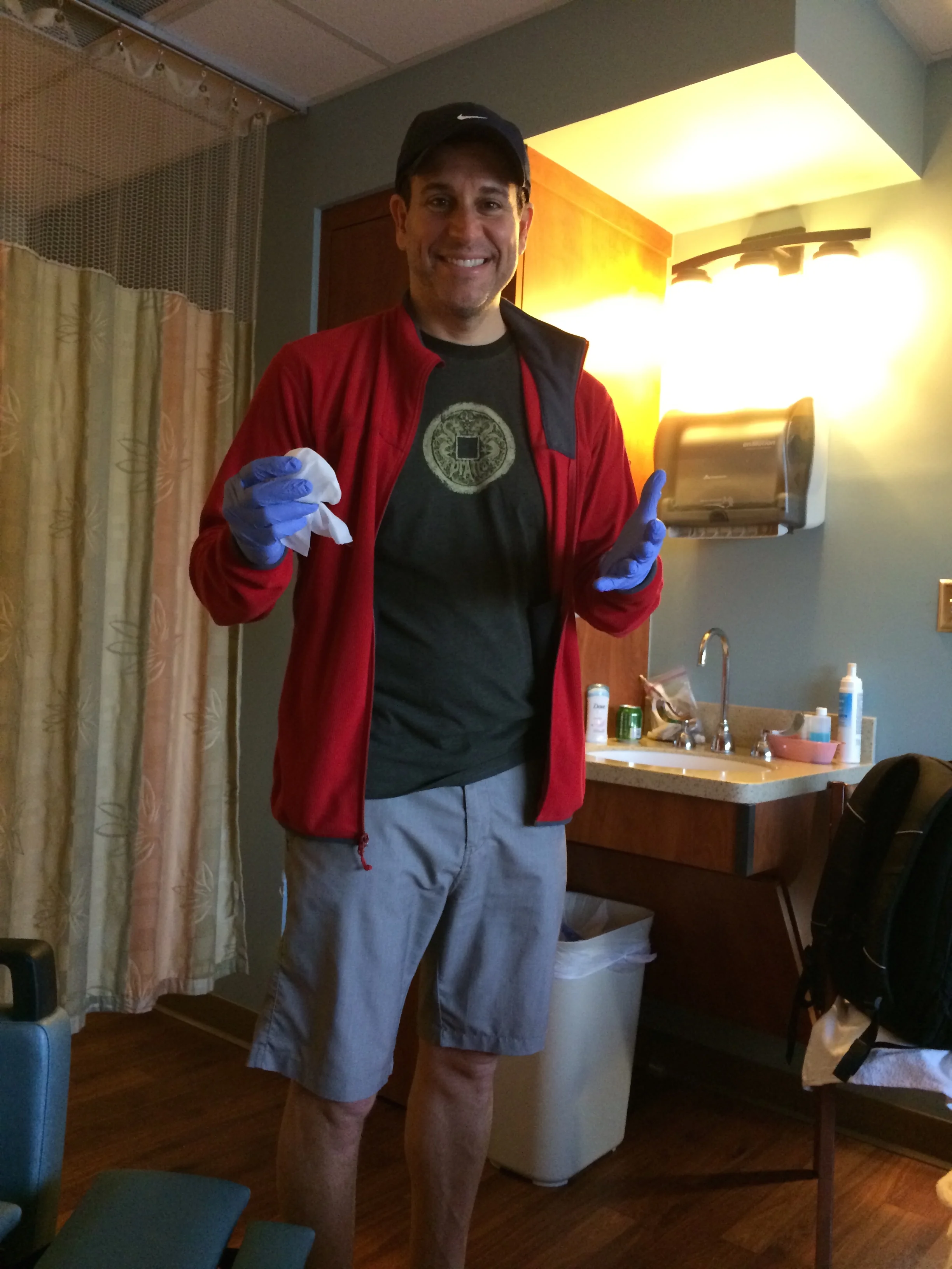 My brother taking care of me after an operation in May 2014.