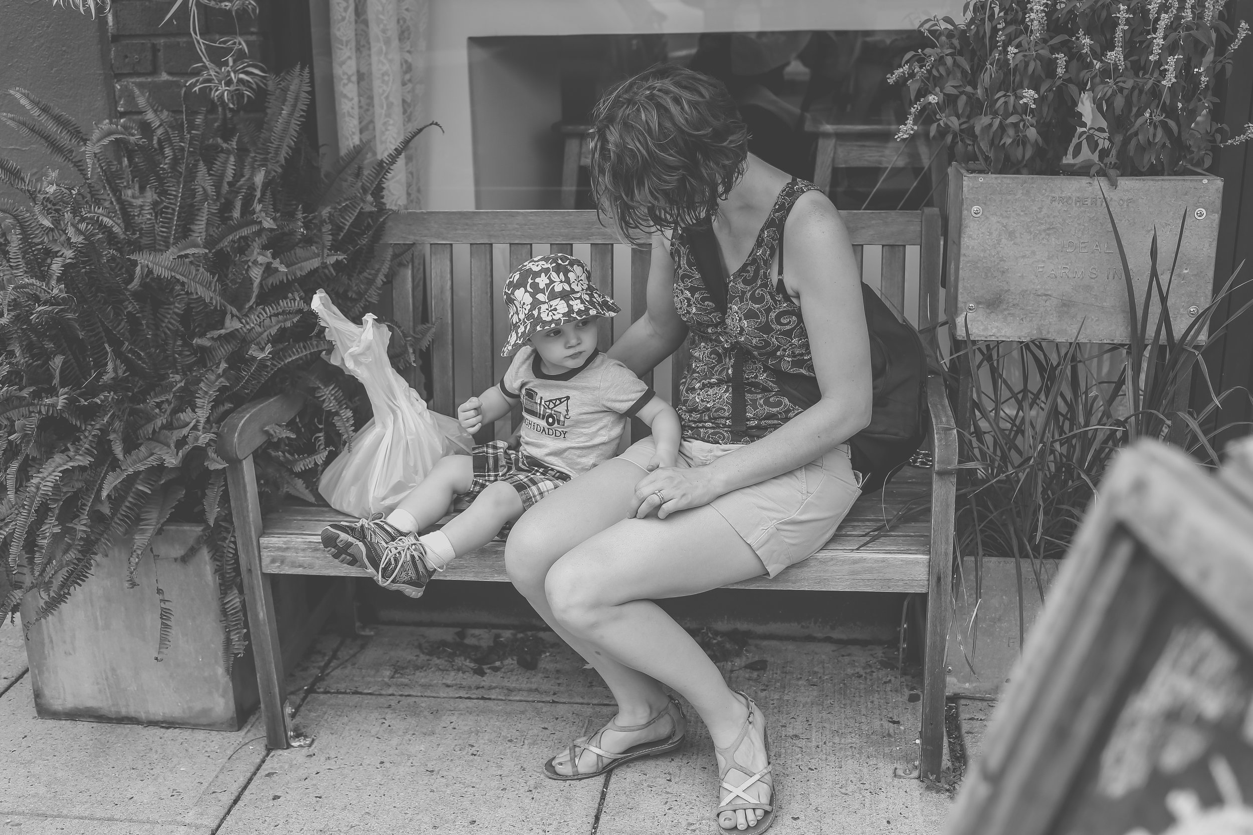 Mother and son sitting on a bench in Rutherford, NJ. Staten Island family photographer.