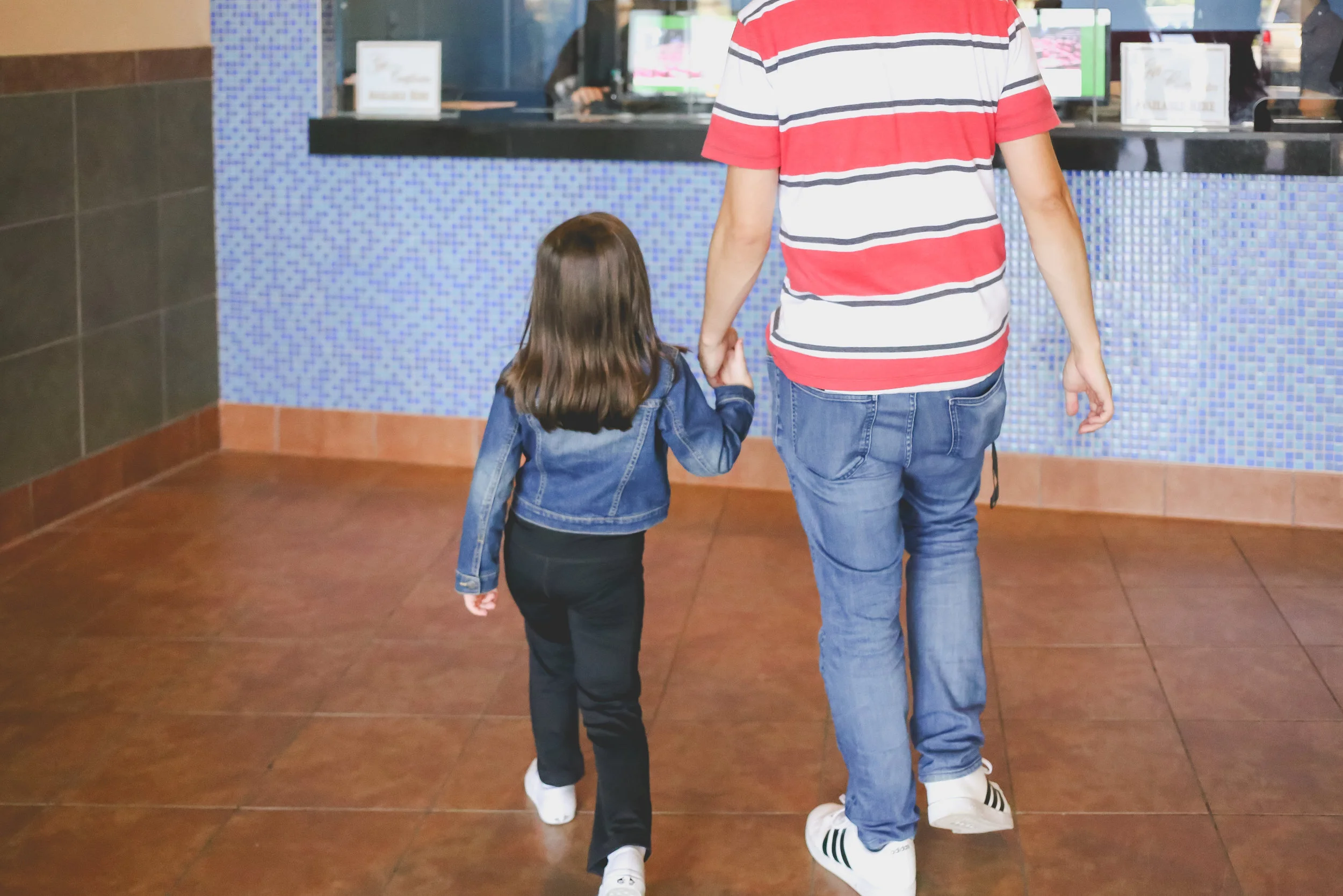 Arriving at The Atrium movie theater in Staten Island, NY. Day in the Life family photography.