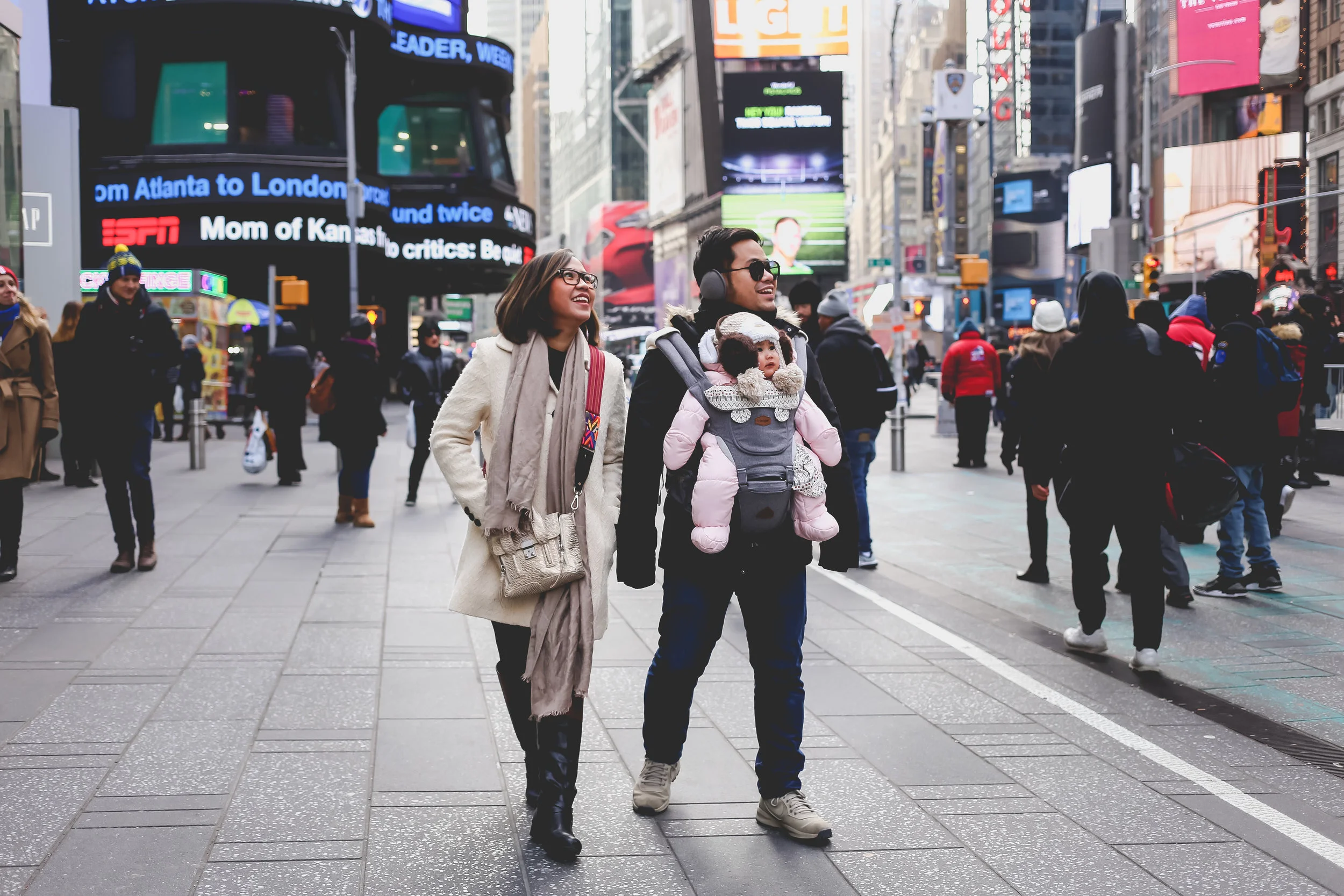 SIghtseeing with baby in Times Square, New York City.