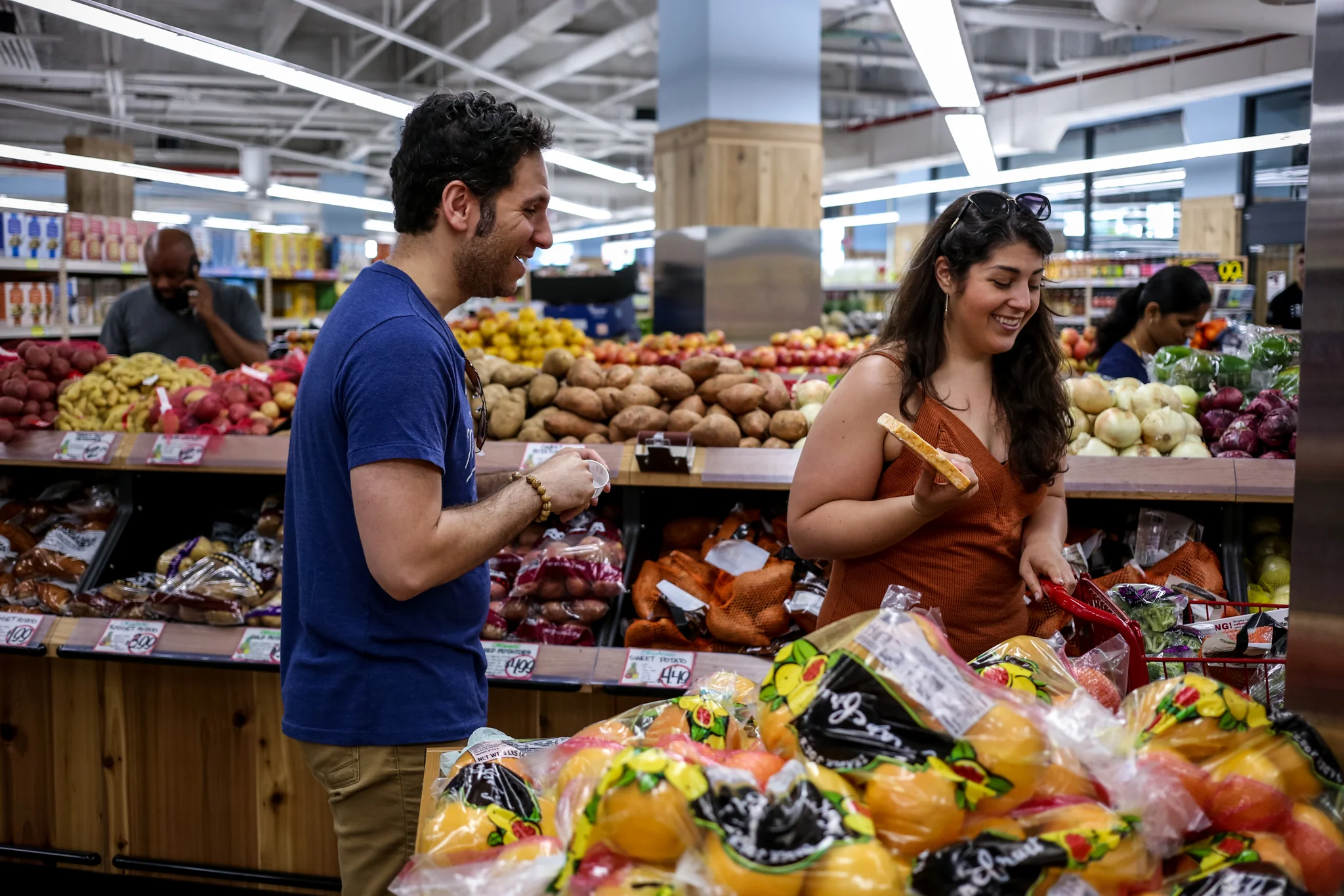 Couple shopping in Trader Joe's in Hoboken, NJ.