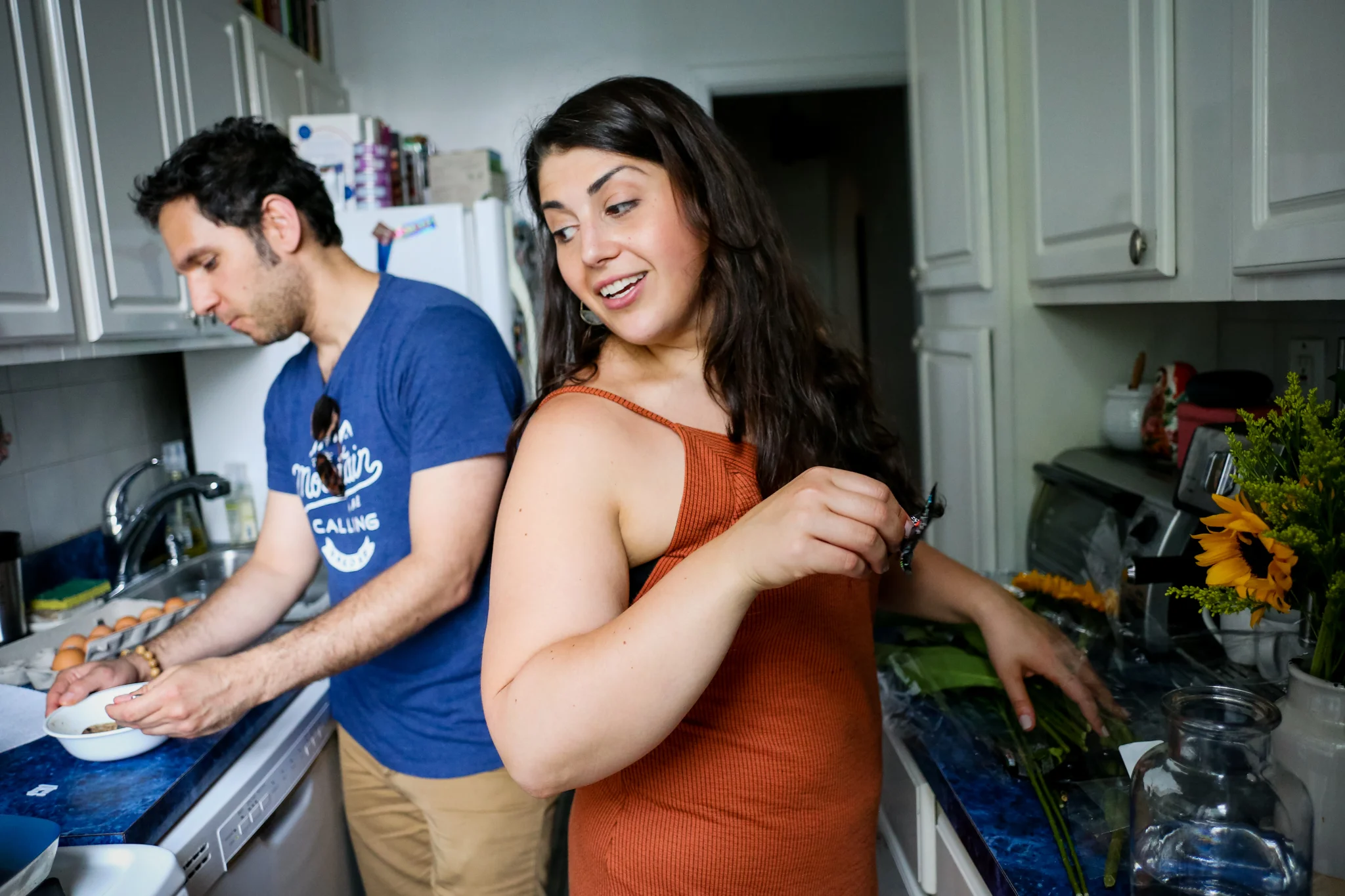 Cooking at home together during an engagement photo shoot with Jen Grima, Lehigh Valley Family Photographer.