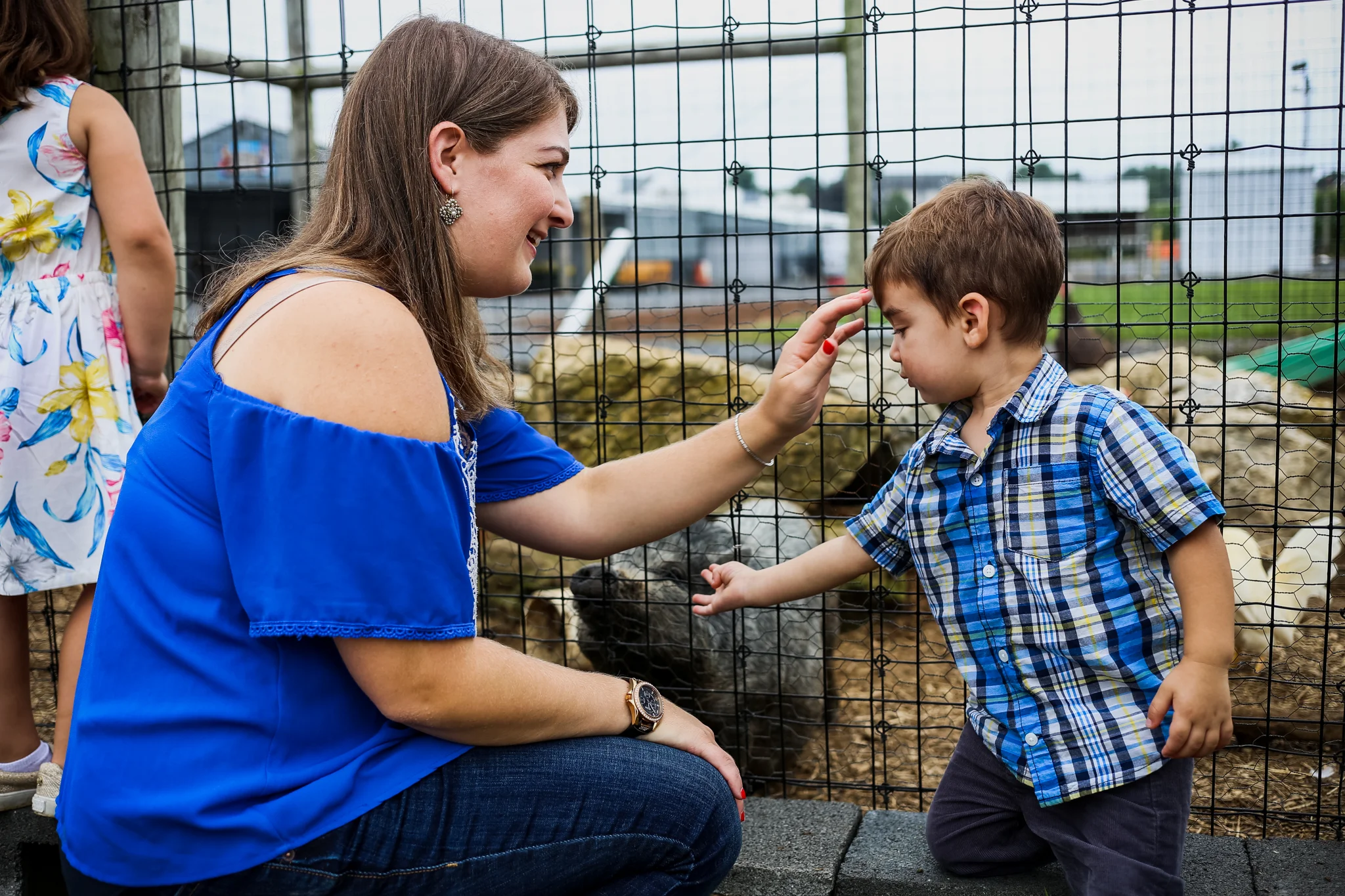 Sweet mother and son moment while visiting the farm animals at Grim’s Orchard in Lehigh Valley, PA.