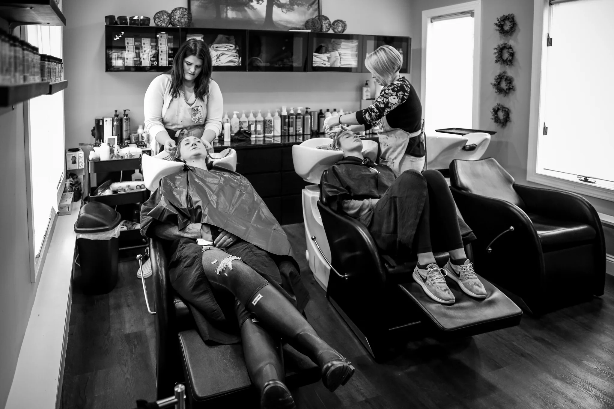 Girls getting their hair washed at Rooted Salon in Allentown, PA.
