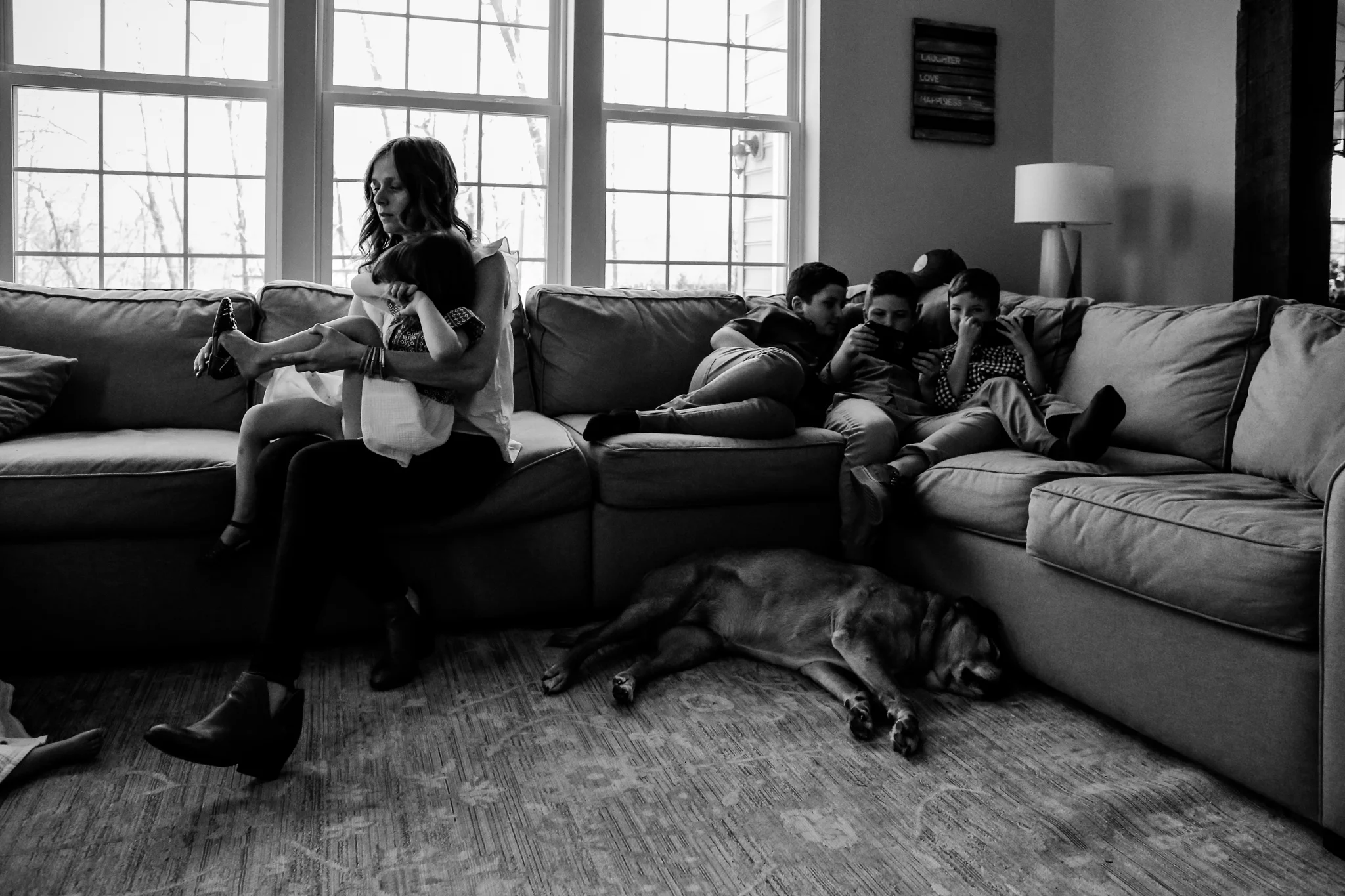 Kids relaxing at home during a documentary family photo session in Coopersburg, PA.