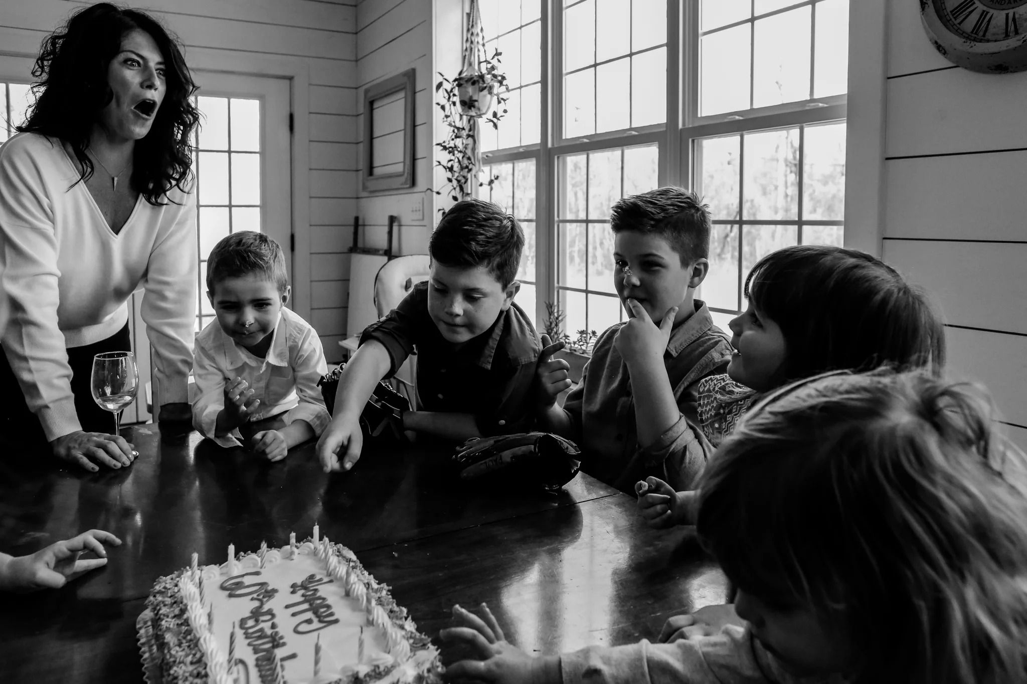 Aunt with her nieces and nephews during a birthday photography session in Lehigh Valley, Pennsylvania.