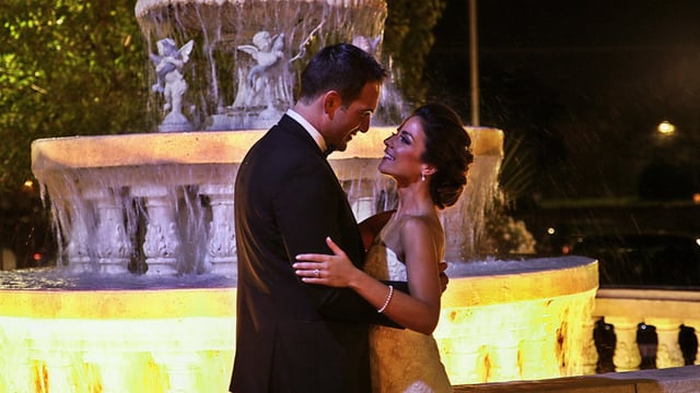 Premium Photo | Tender wedding couple poses in a green park