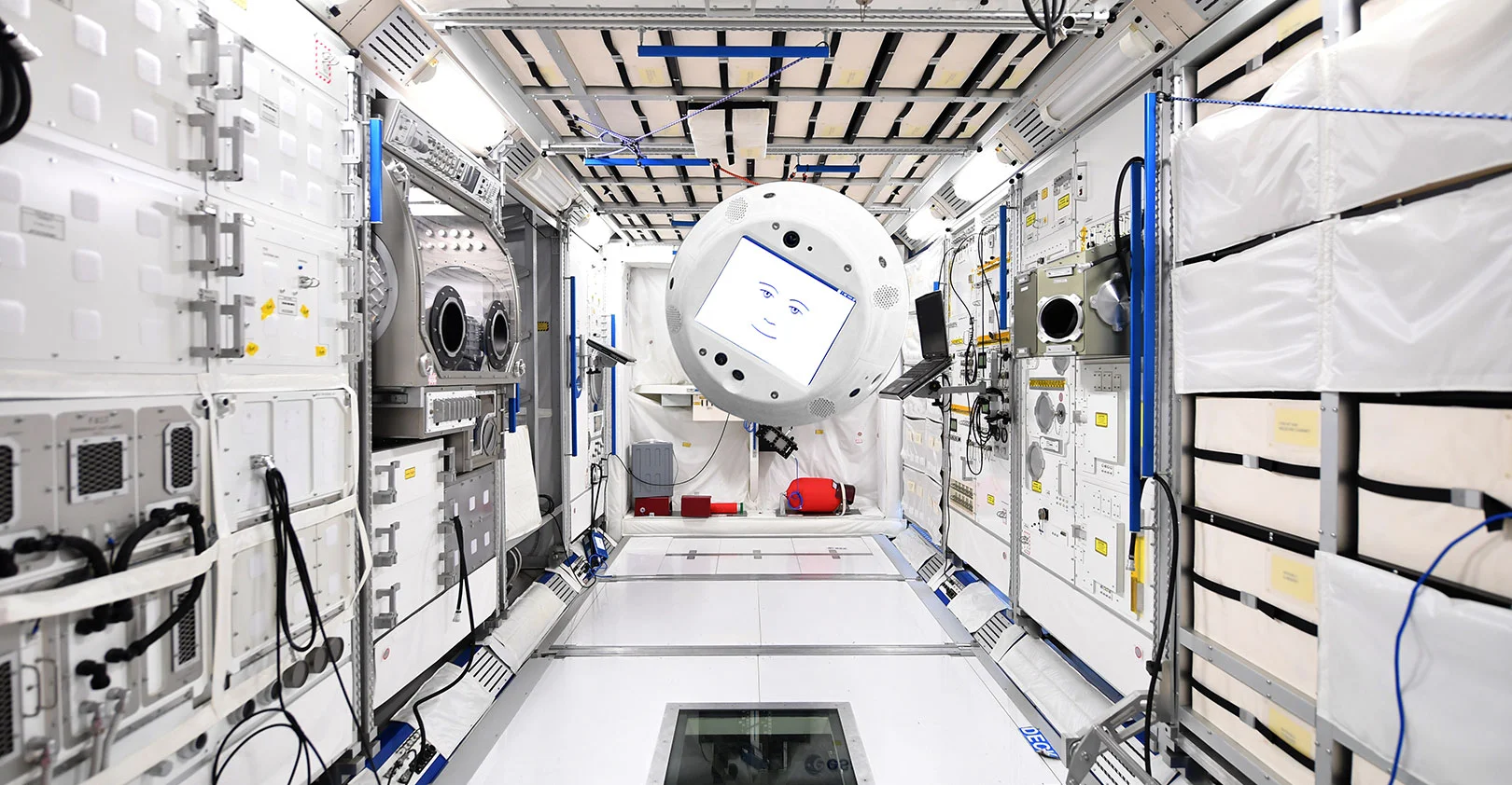 A photo illustration of a CIMON aboard the ISS.