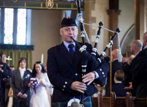 john_campbell_bagpiper.png