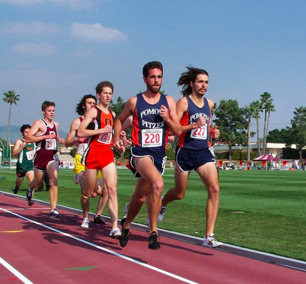 Freeman running for Pomona with teammate Will Leer.