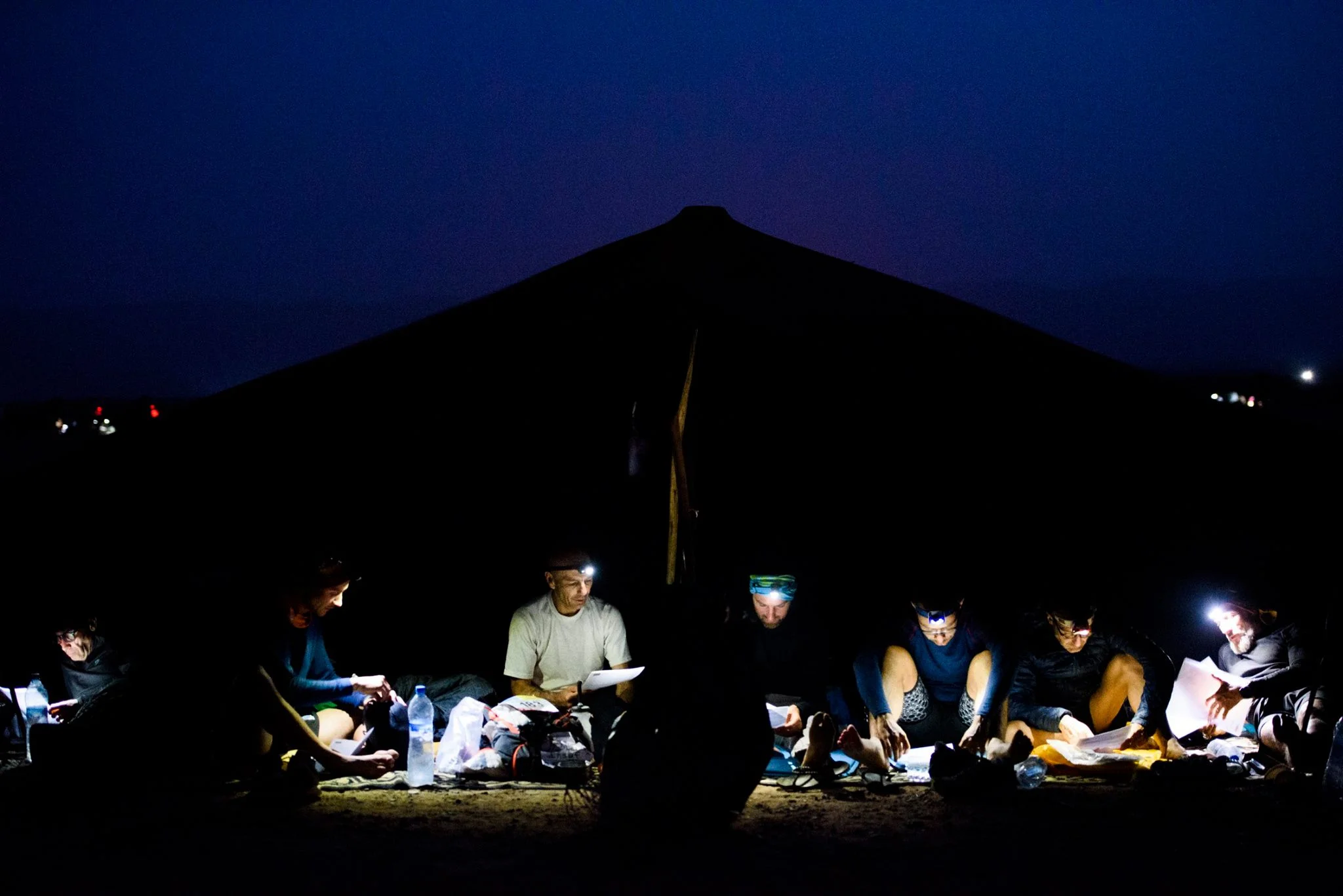 Runners in tents before a race stage. Photo: CIMBALY/MDS2018. 