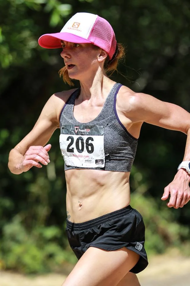 Caitlin finishing the 2016 Woodmonster Trail Race. Photo: Stephen Woo.