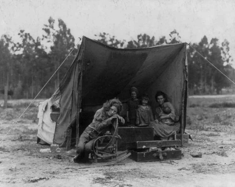 Dorothea Lange , ‘Nipomo, Calif. March 1936. Migrant agricultural worker's family. Seven hungry children and their mother, aged 32. The father is a native Californian.'