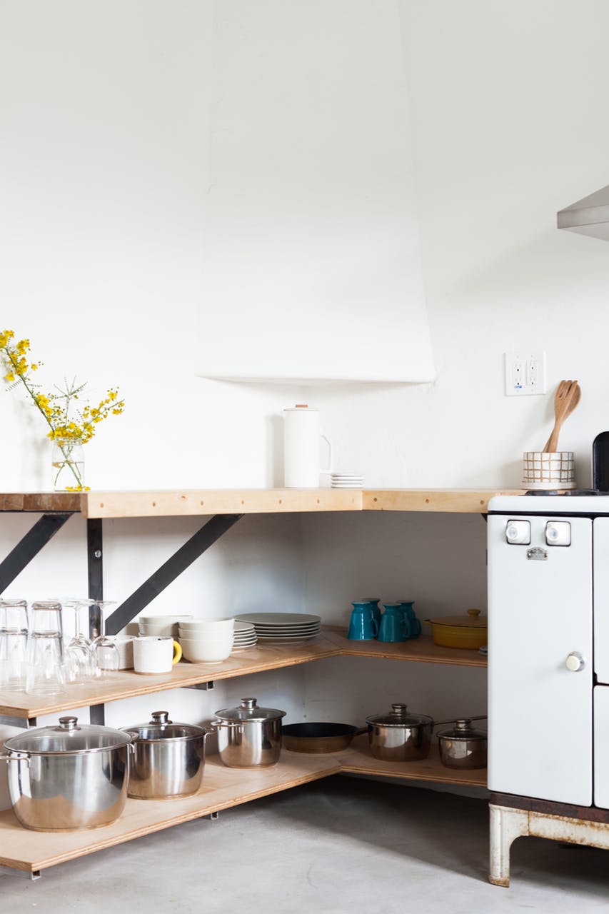 A maple drop down edge strip was added to the face of the countertops using dowels for strength & aesthetic.