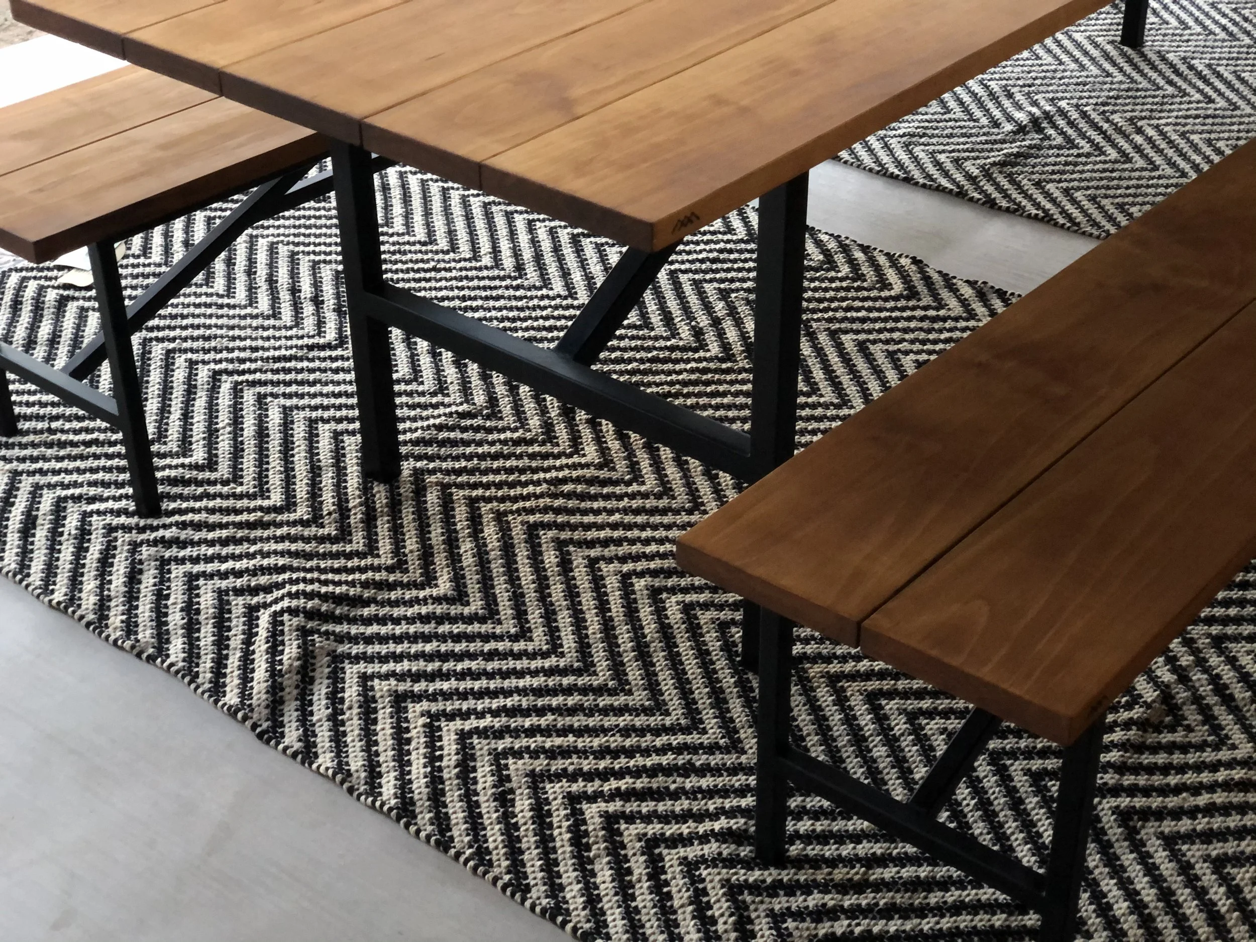 Accoya tops and black steel bases. Rugs provided by Boxhill.