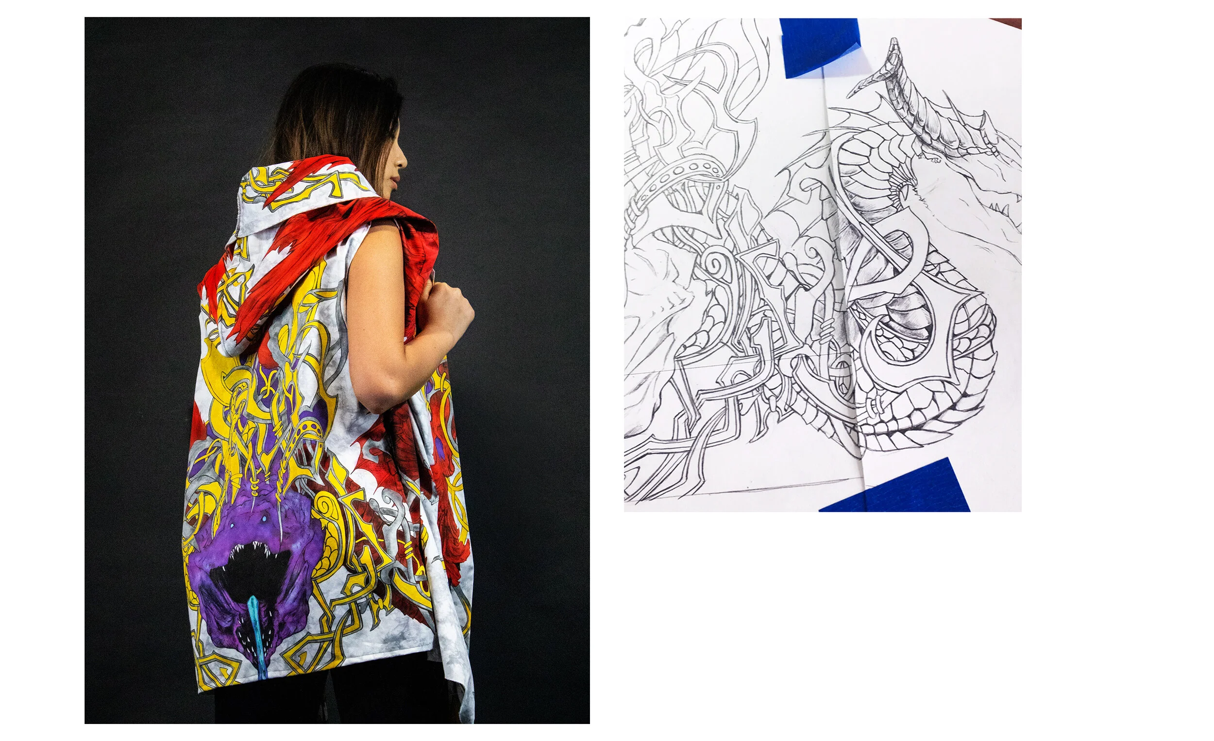 A woman is wearing a colorful, patterned hoodie featuring a dragon, chains, and a creature with sharp teeth, with her hand clutched in front of her chest. Next to her, a detailed black and white sketch of the same dragon and scene is taped to a wall.