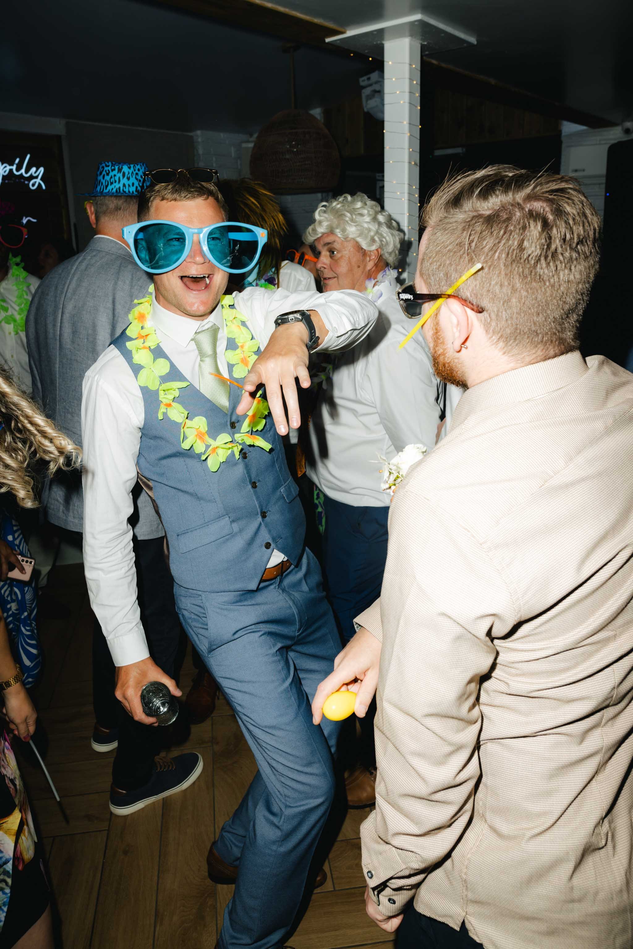 Guests on the dance floor at Watermouth Cove Weddings
