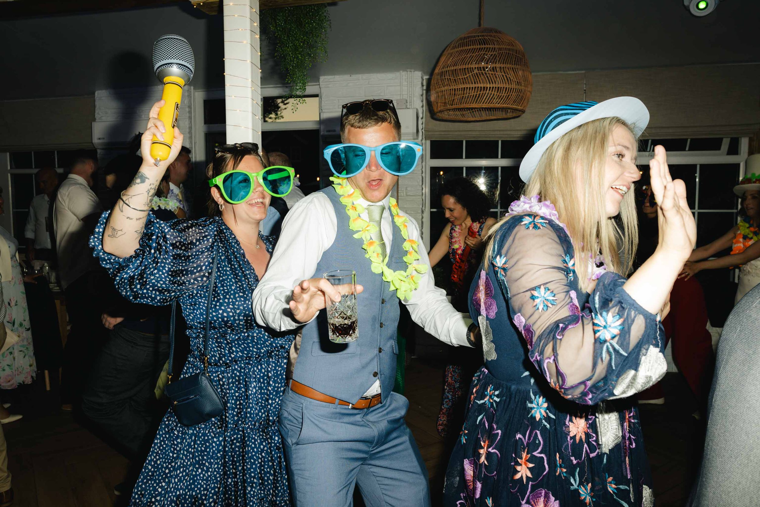 Wedding guests dancing at Watermouth Cove