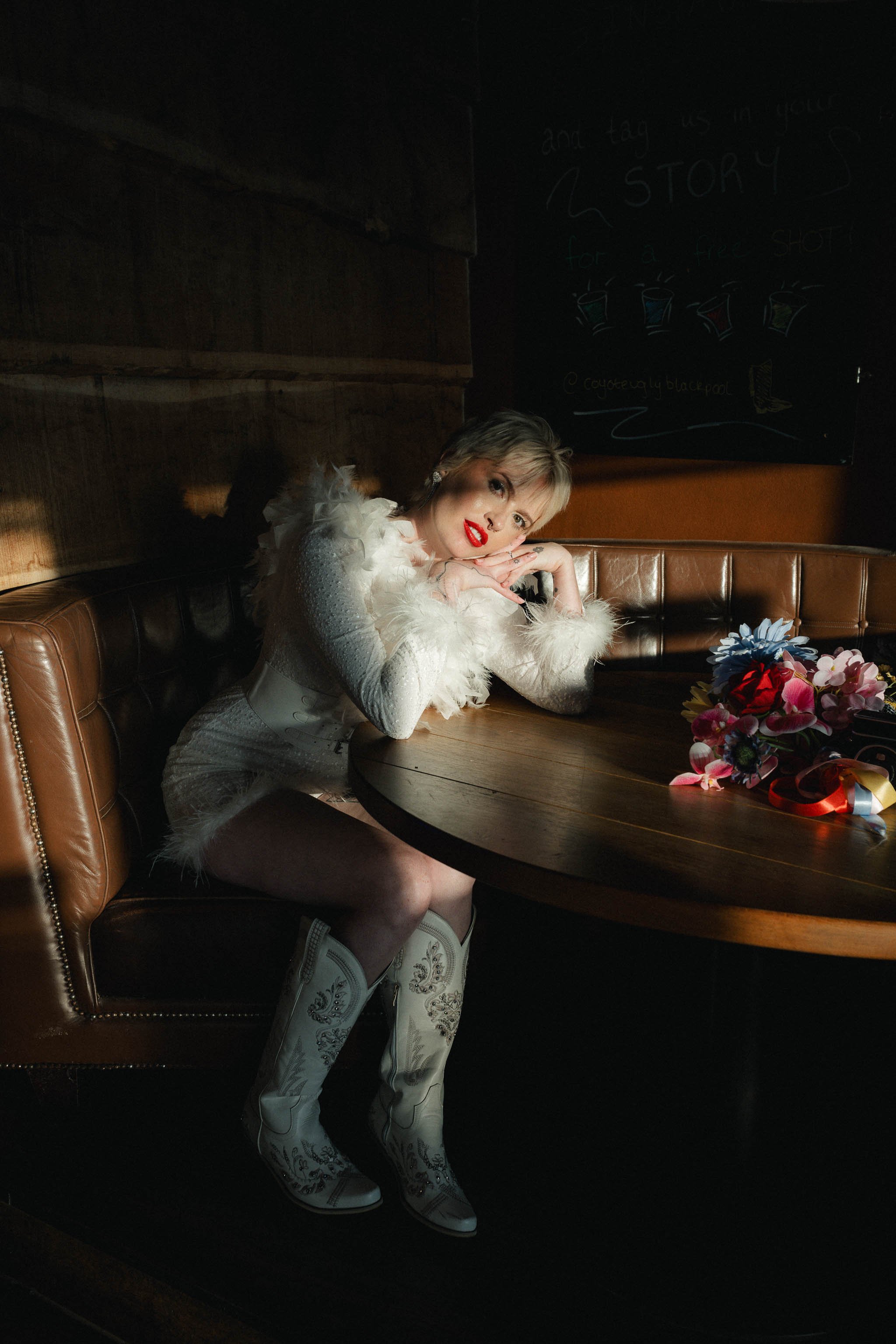 Artistic portrait of a bride in a burger bar