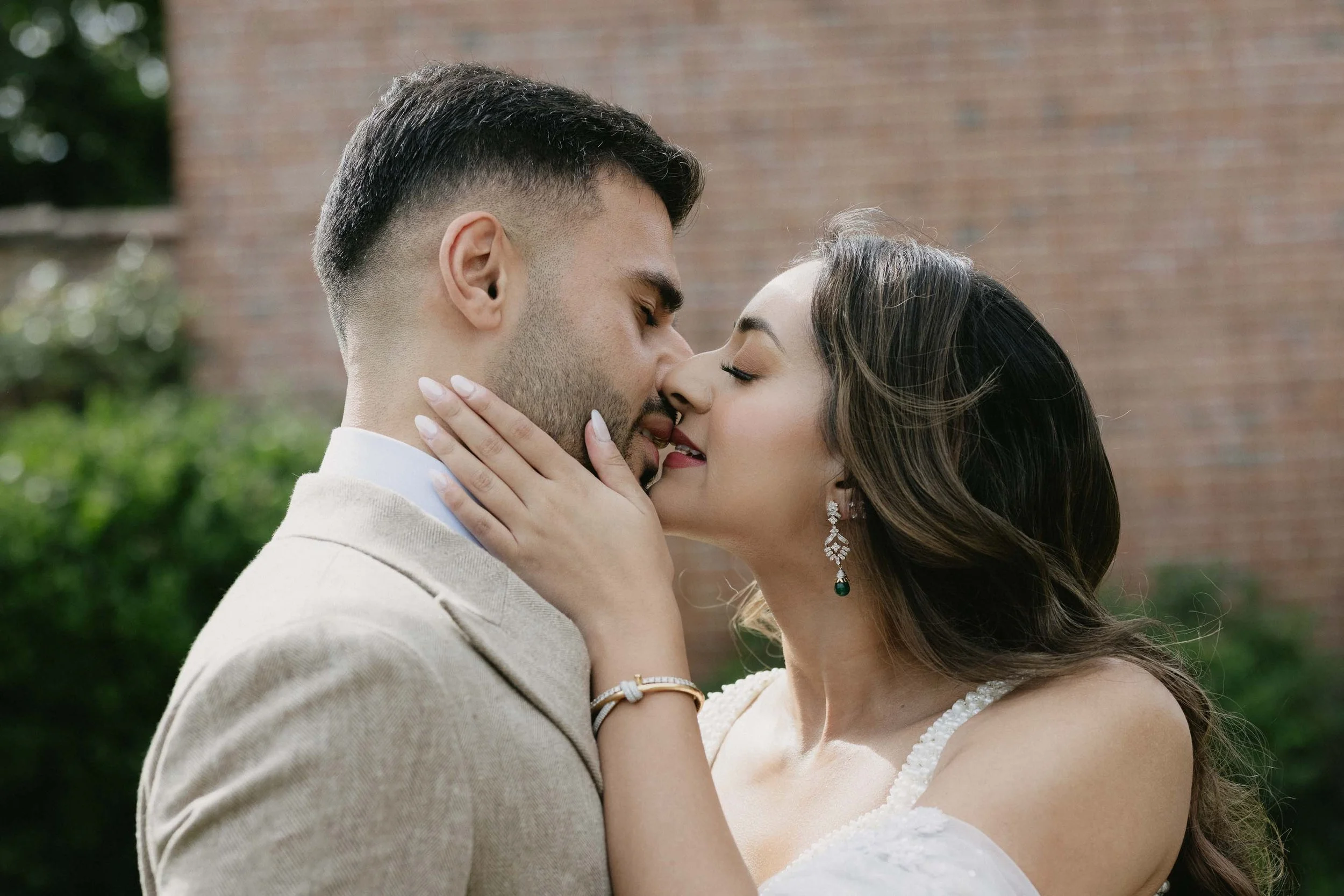 Close up of a couple kissing during an engagement shoot.