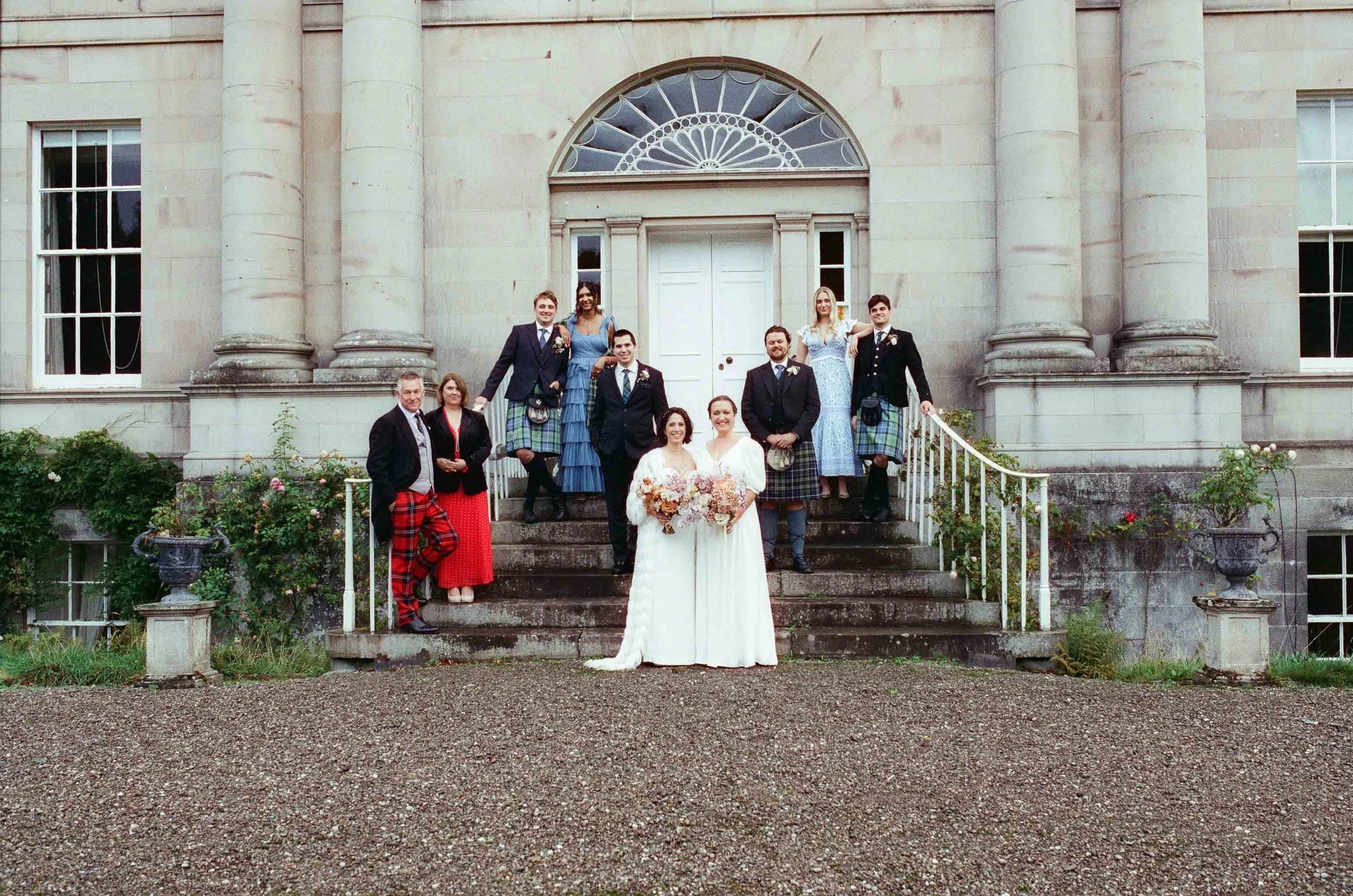  Editorial style group photo captured on 35mm film outside The Byre at Inchyra. 
