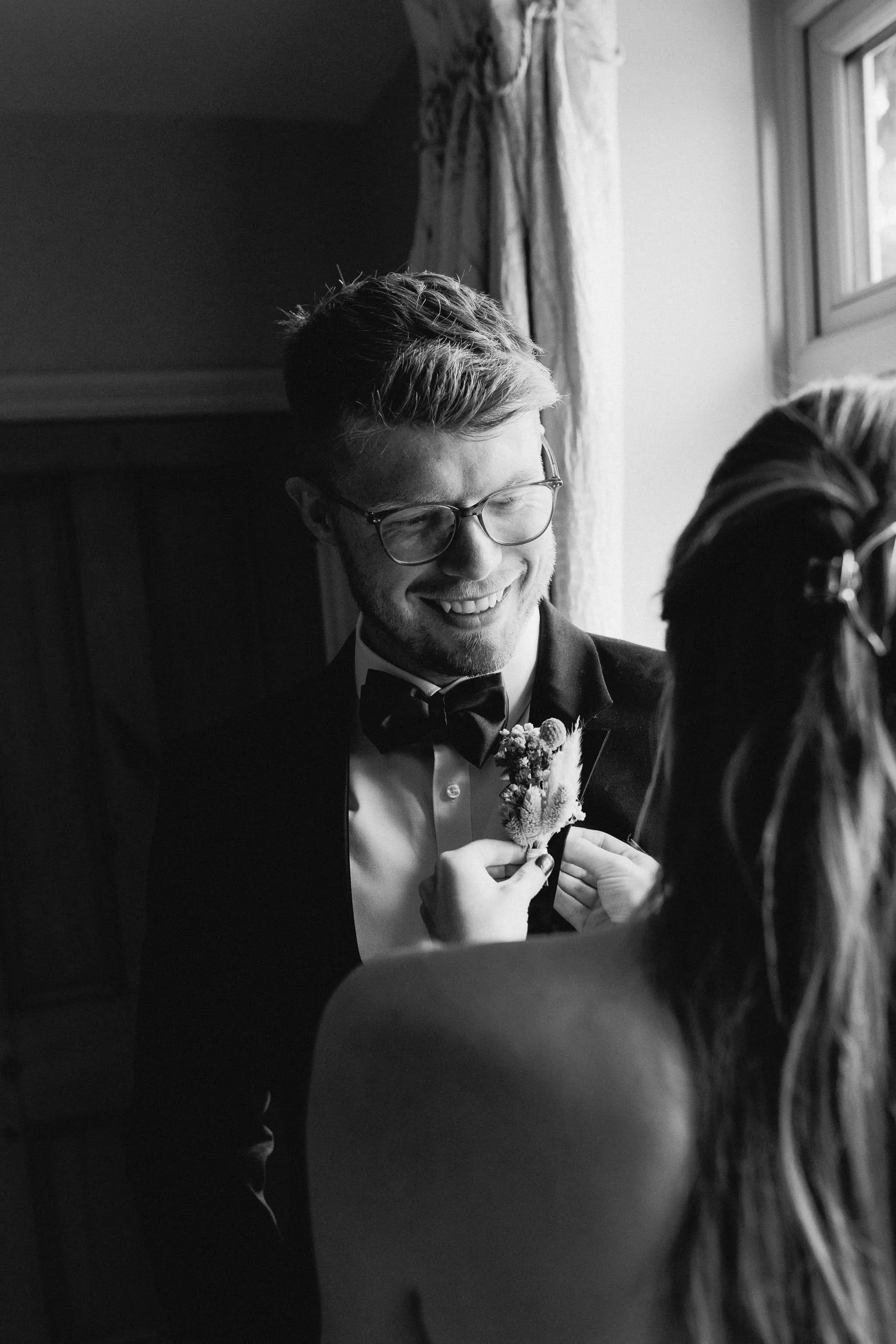 Groom Oli getting ready at home before Worcester Guildhall ceremony.   