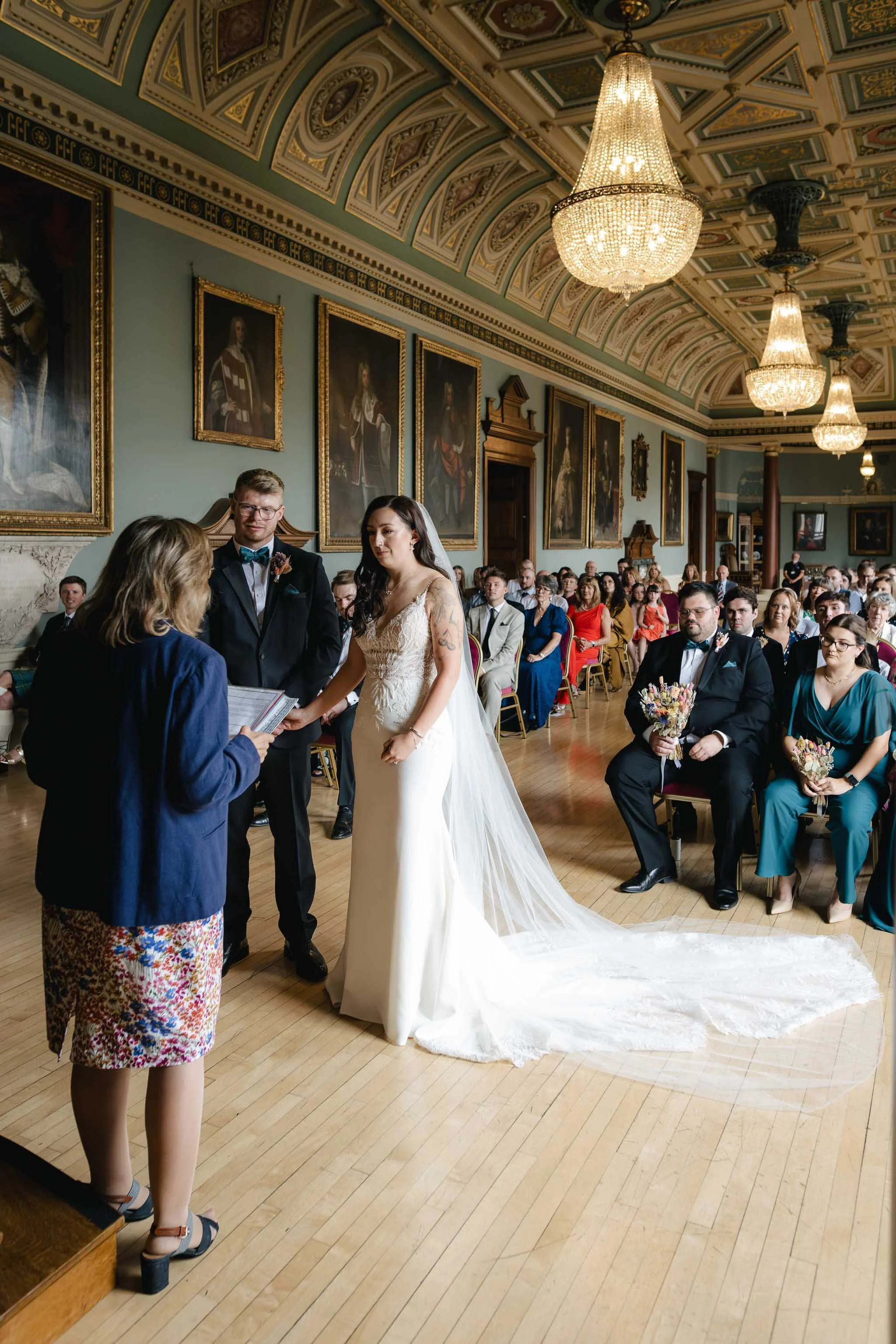  Bride and groom during a wedding ceremony at Worcester Guildhall. 
