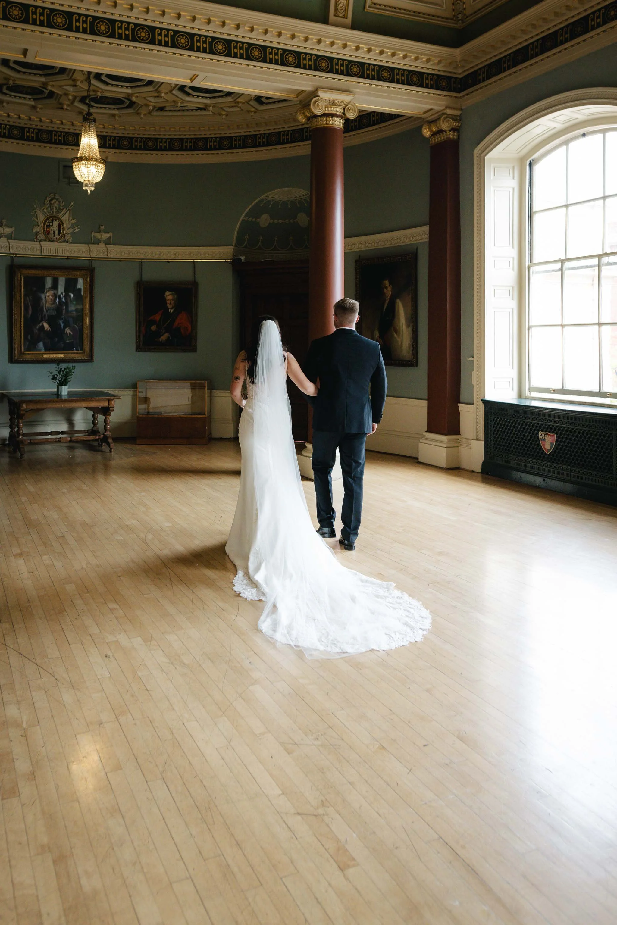  Jess + Oli walking down the aisle at Worcester Guildhall wedding. 