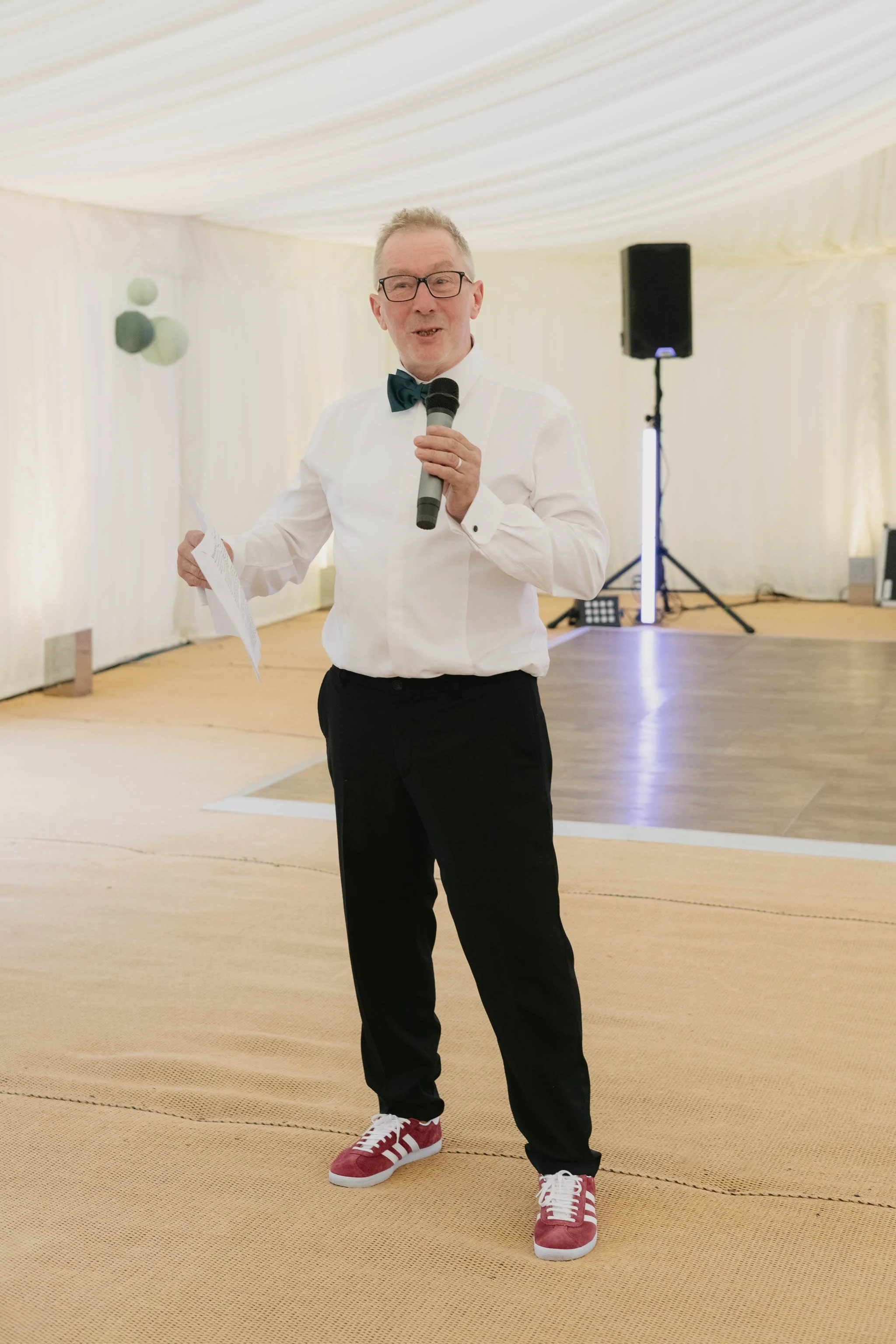  Father of the bride giving a speech in a wedding marquee in Worcester. 