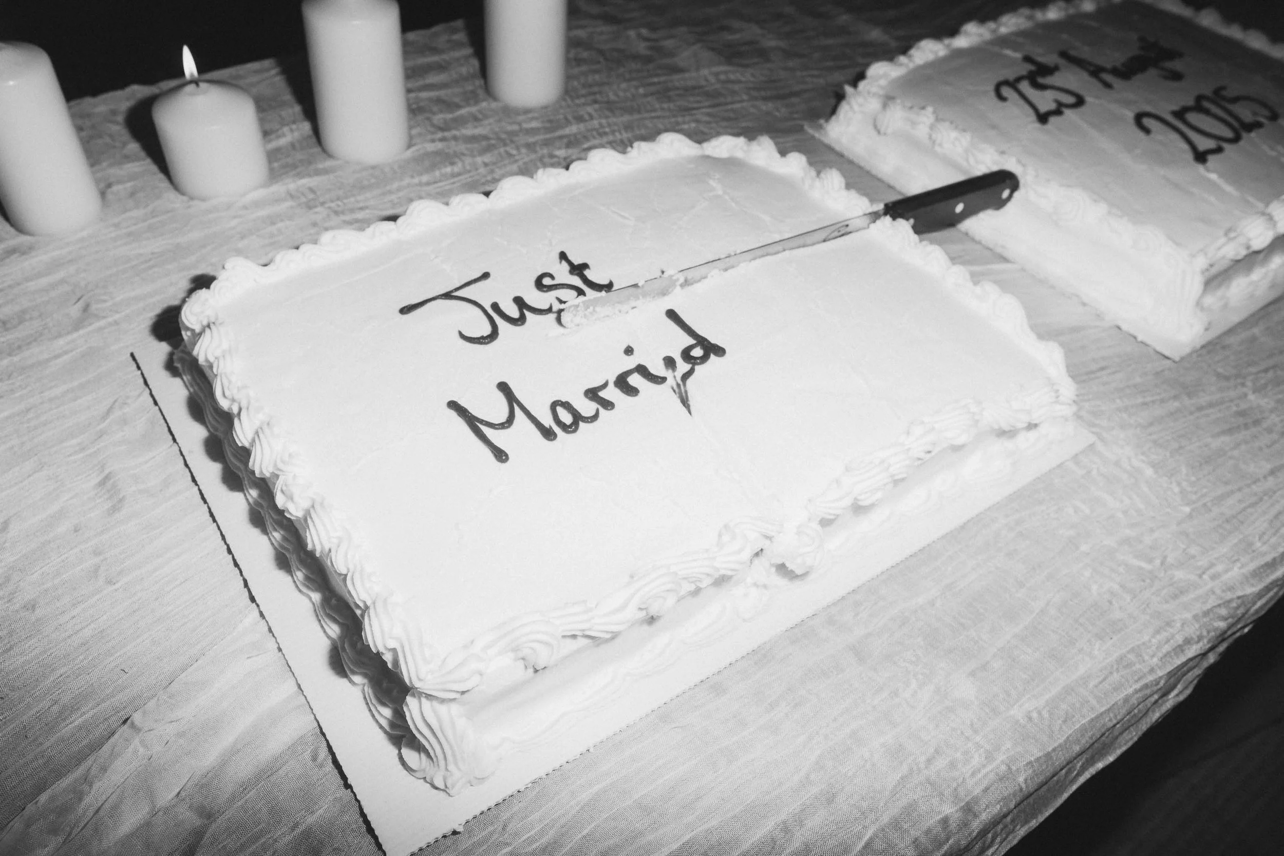  Wedding cake close-up with ‘Just Married’ detail at Worcester marquee wedding.   