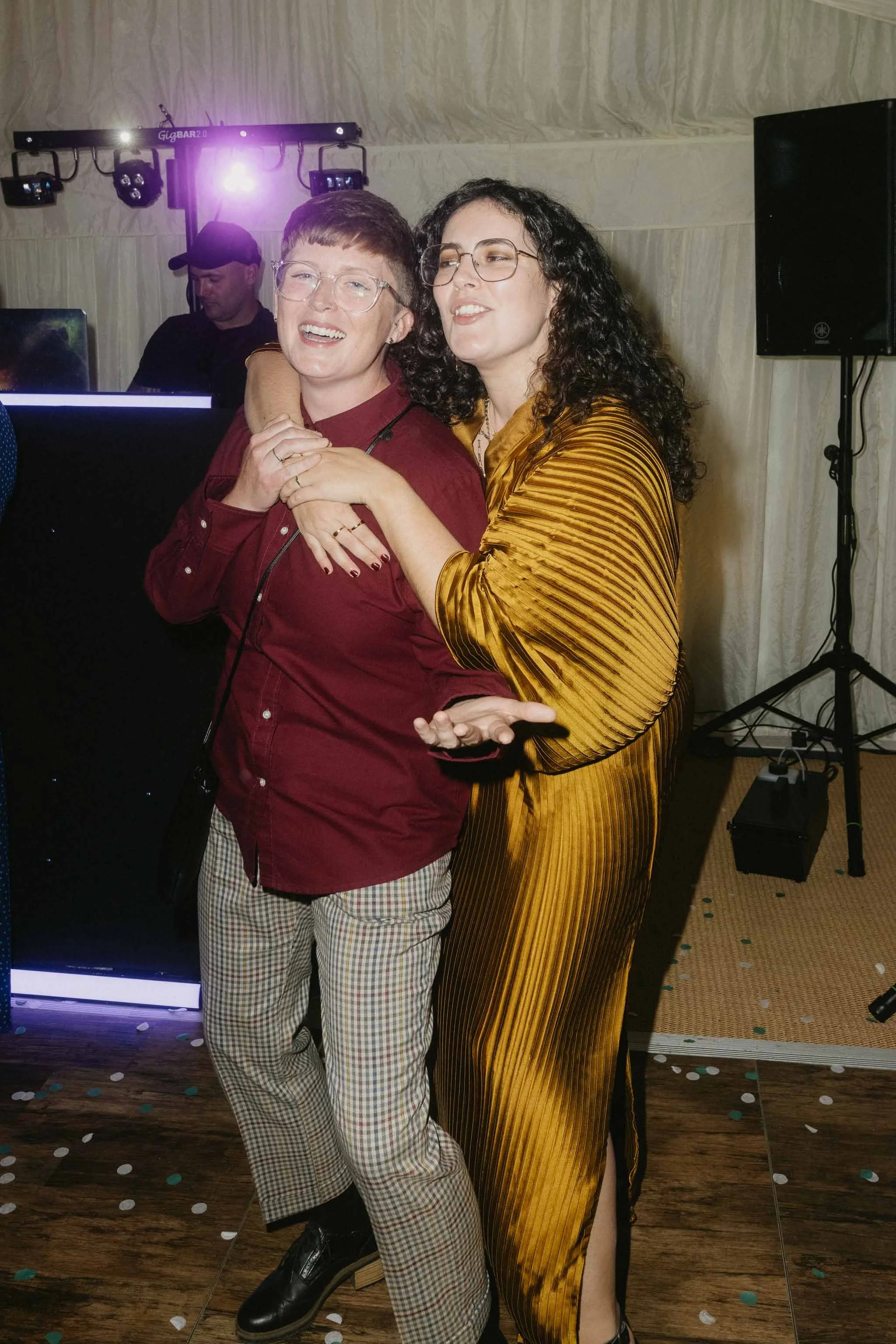  Fun and lively wedding celebration with guests at Worcester marquee reception.   