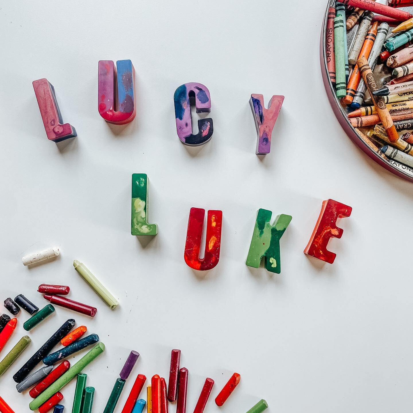 We melted crayons to make letters! Such a fun project to do with the kiddos and they loved the process. The special thing about these little crayon letters is the crayons we melted came from the big tin of crayons I used to color with at my Grandma&r