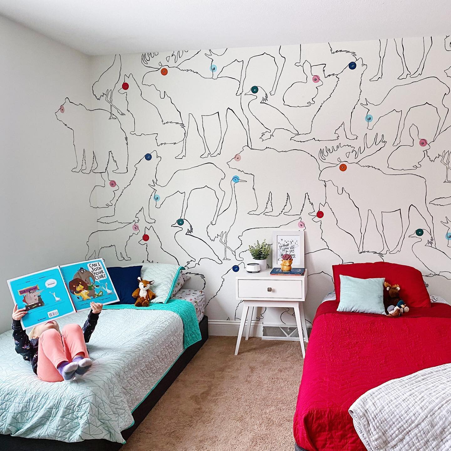 This mural was a huge labor of love. It took me an embarrassing amount of hours to illustrate, design, transfer and paint, but man I&rsquo;m in love! The kiddos absolutely love it! They tell me nightly how much they love sleeping with all these anima