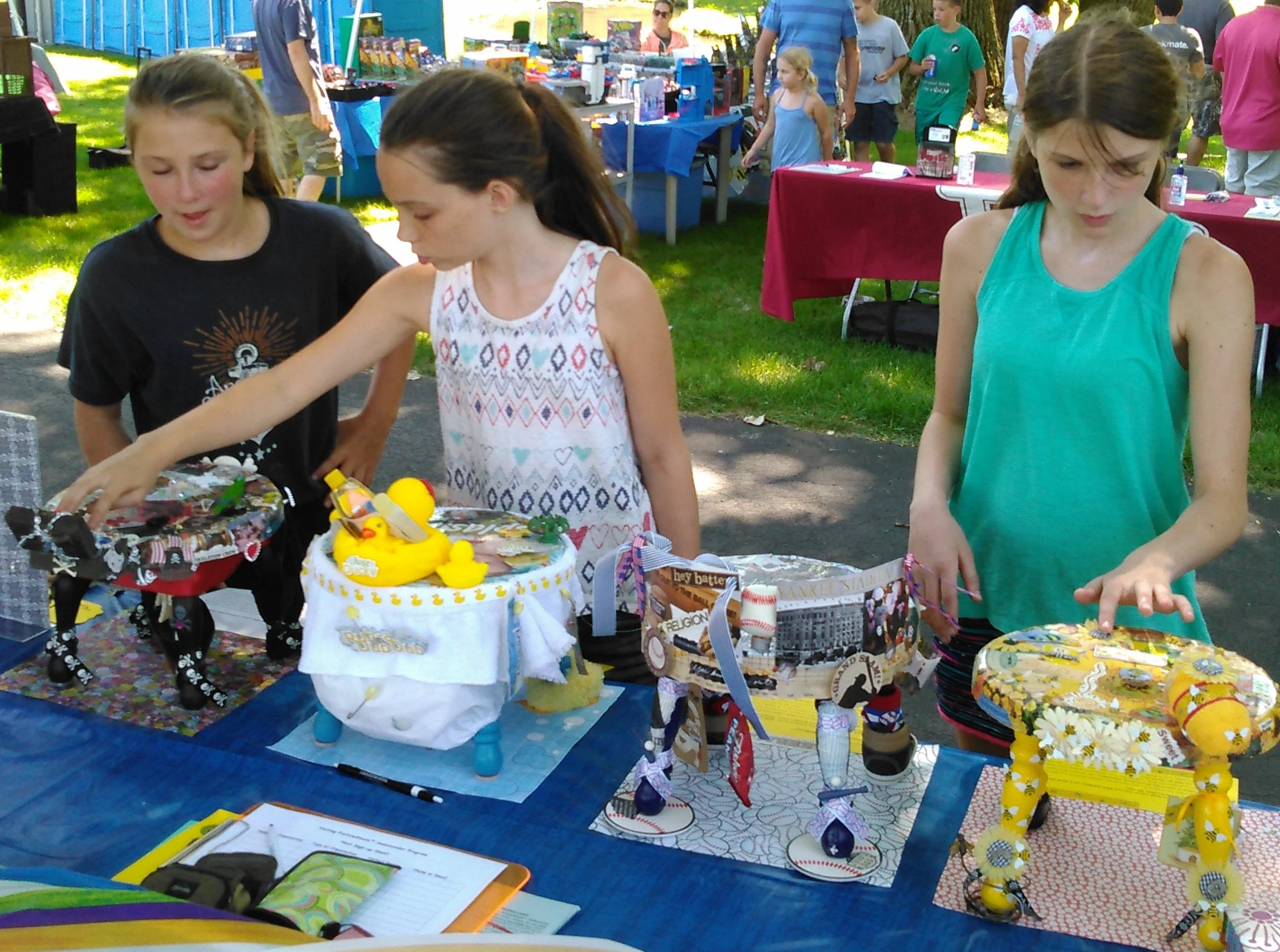 These are so cute, I’ve just gotta touch ‘em! FootsieStool admirers at Hamilton Sundstrand Association Picnic.