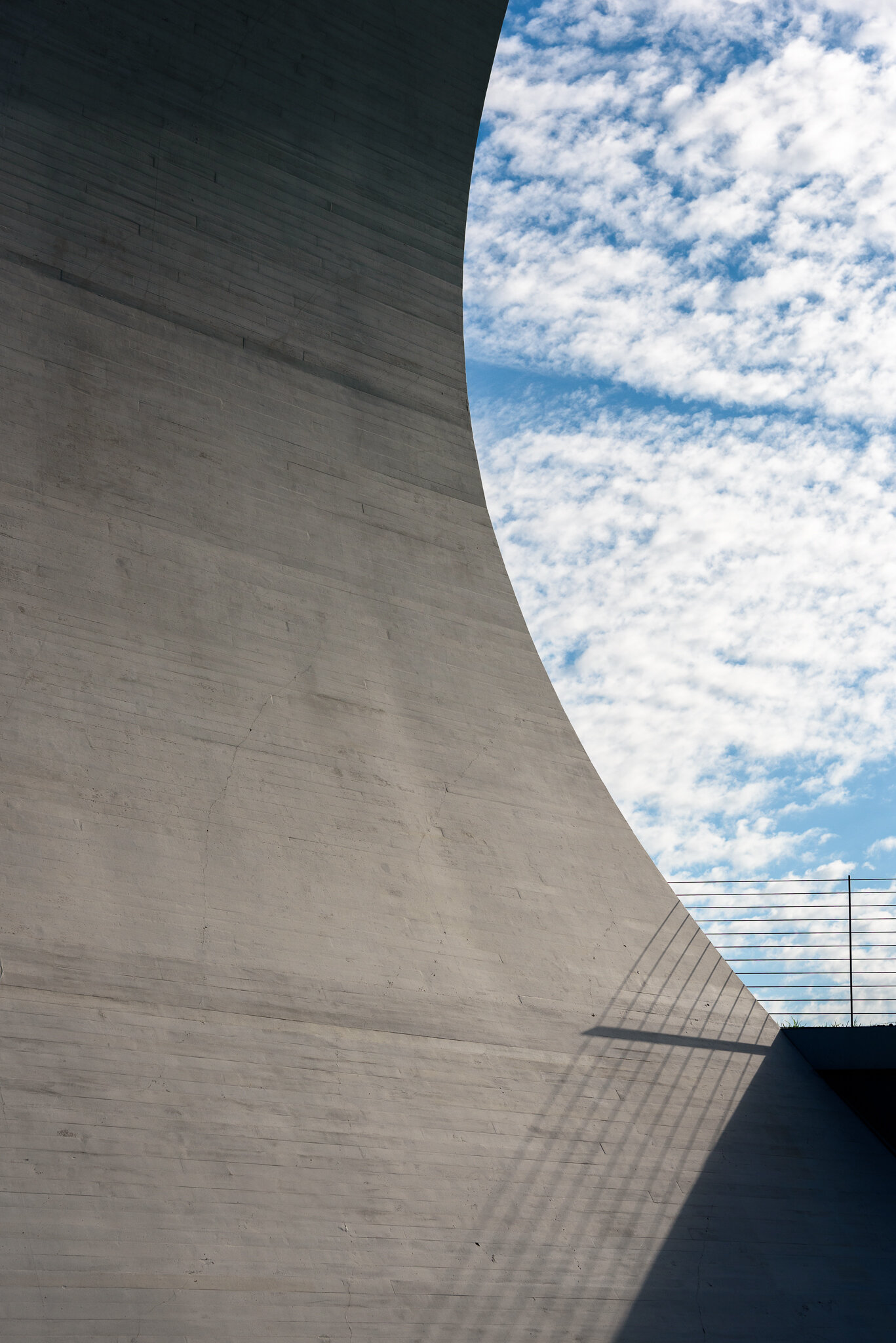 Architecture of the Kennedy Center's Reach with blue sky.
