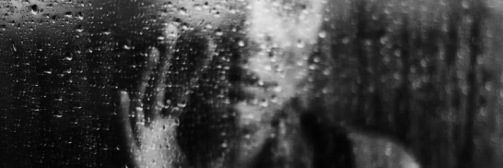 woman sad at window.jpg