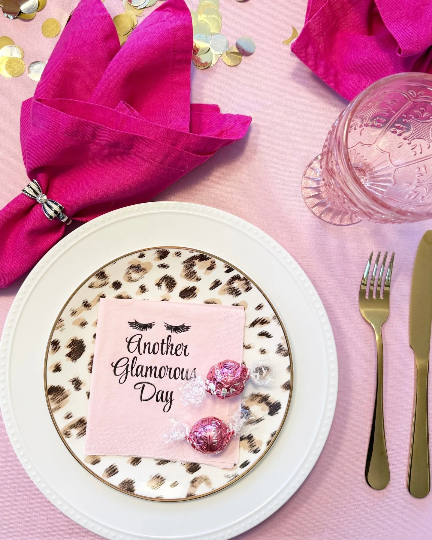 Tablescape inspo!  Grab my Another Glamorous Day napkins and then pull out some pink touches and a little leopard, too.  This one is perfect for a girls' night in or Galentine's party. #tablescape #galentines #anotherglamorousday