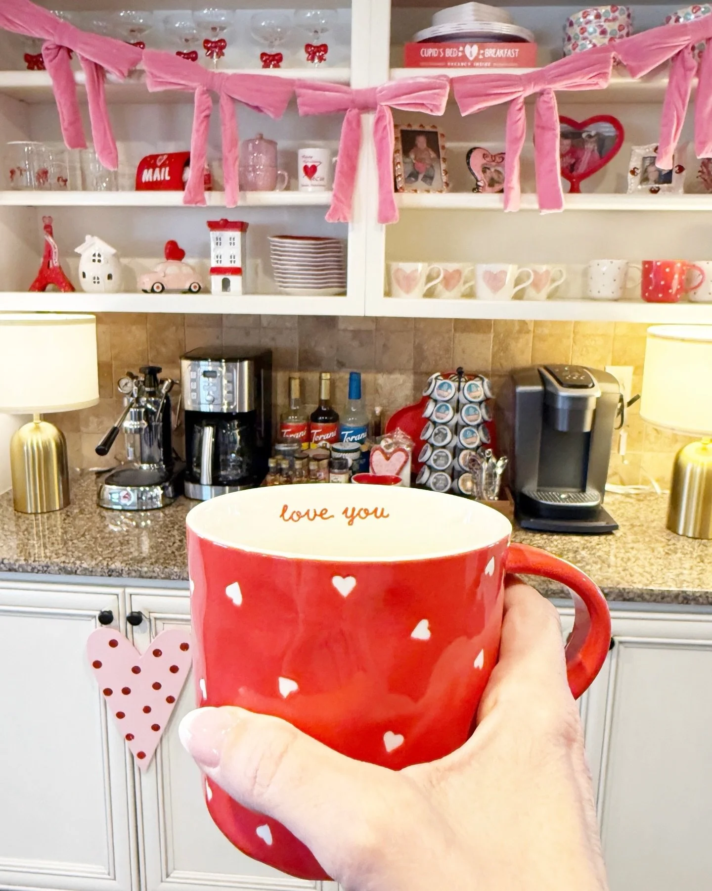 Cupid&rsquo;s Coffee Bar is open for business! Comment SHOP for the link to this darling bow garland - it&rsquo;s on clearance for just $8! #coffeebar #valentinesdecor
