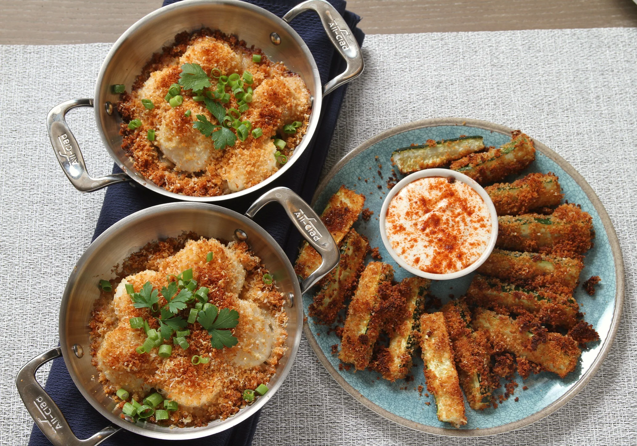 Baked scallops and baked zucchini sticks. 