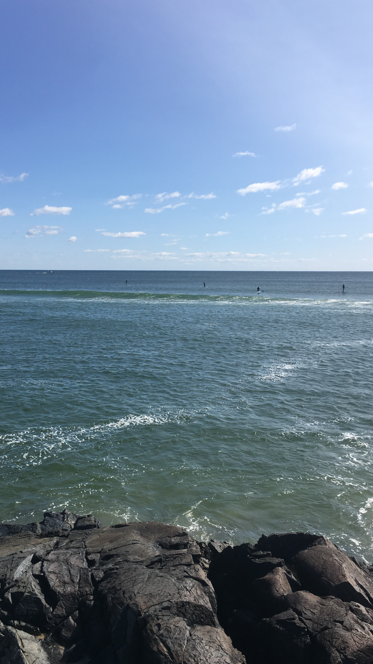 Summer surfers in Maine as the season winds down. 