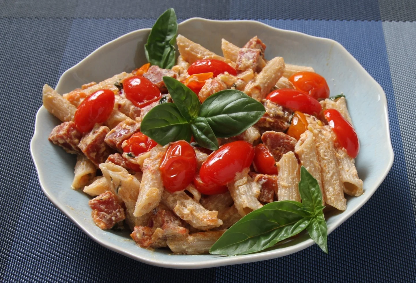 Candid shot of a delicious pasta made recently with ricotta, tomatoes, and pepperoni. Decadent and spicy, perfect for the weekend! 