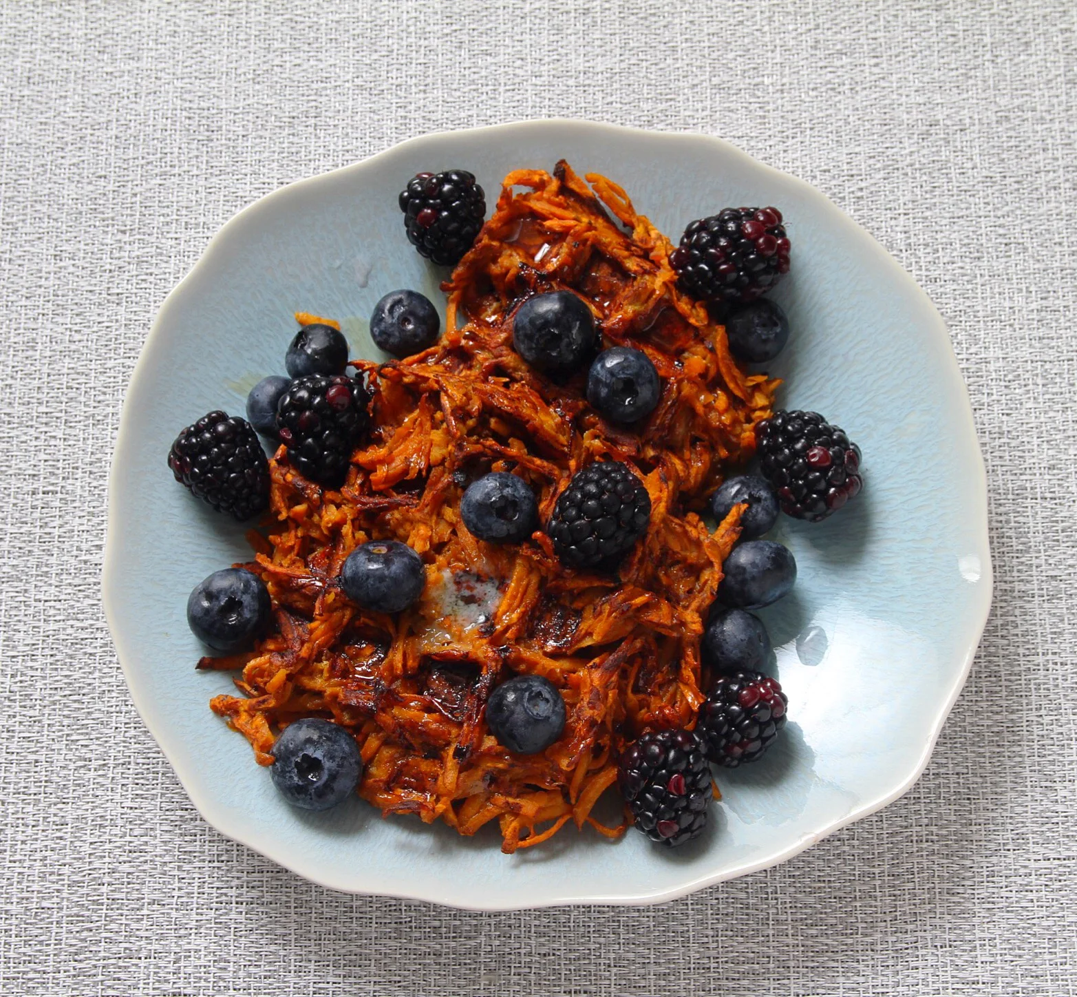 Sweet potato waffles with blueberries and blackberries. Syrup required!  