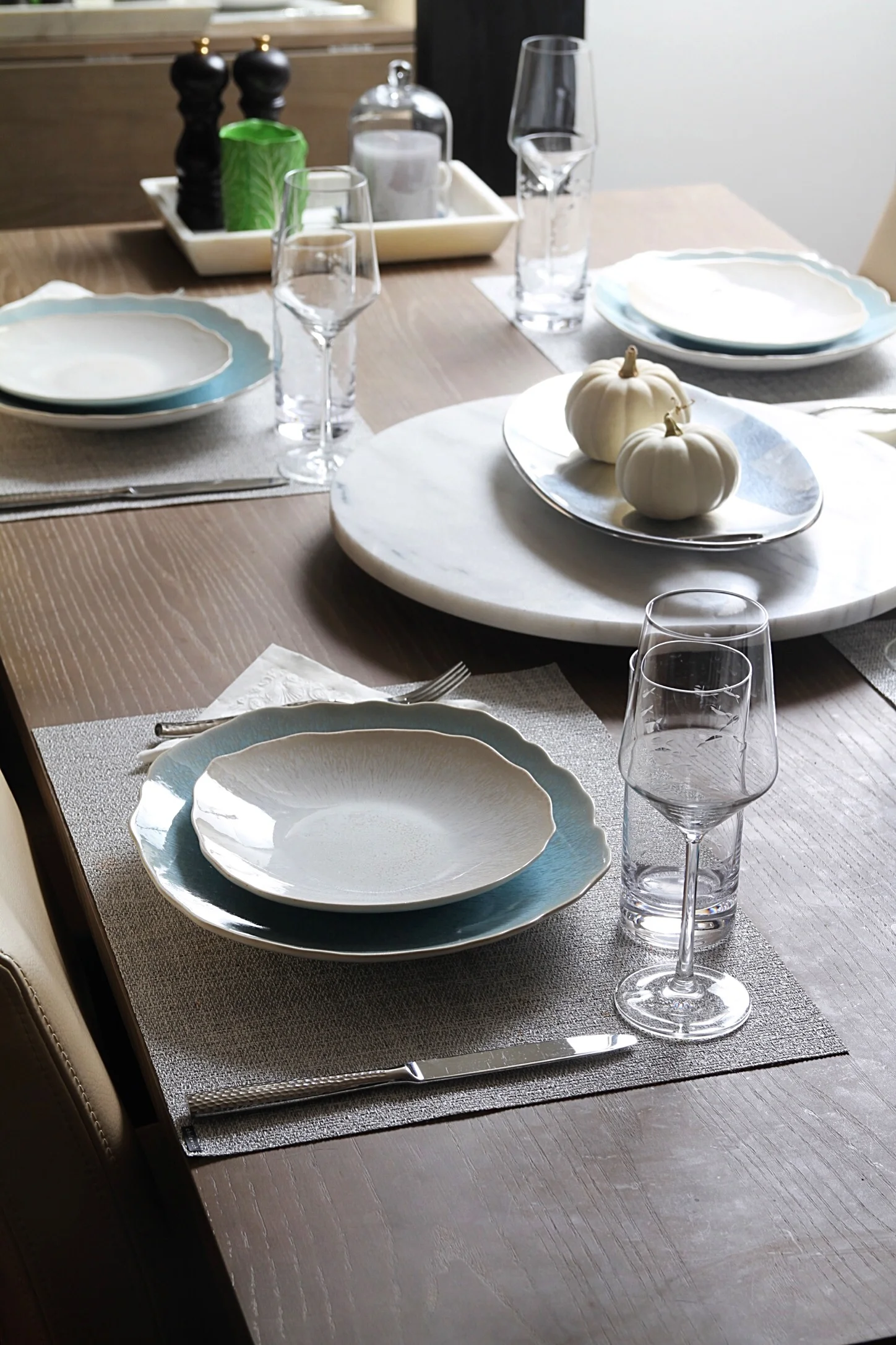 Our table all set for a dinner party last weekend. Love the white pumpkin decor!  