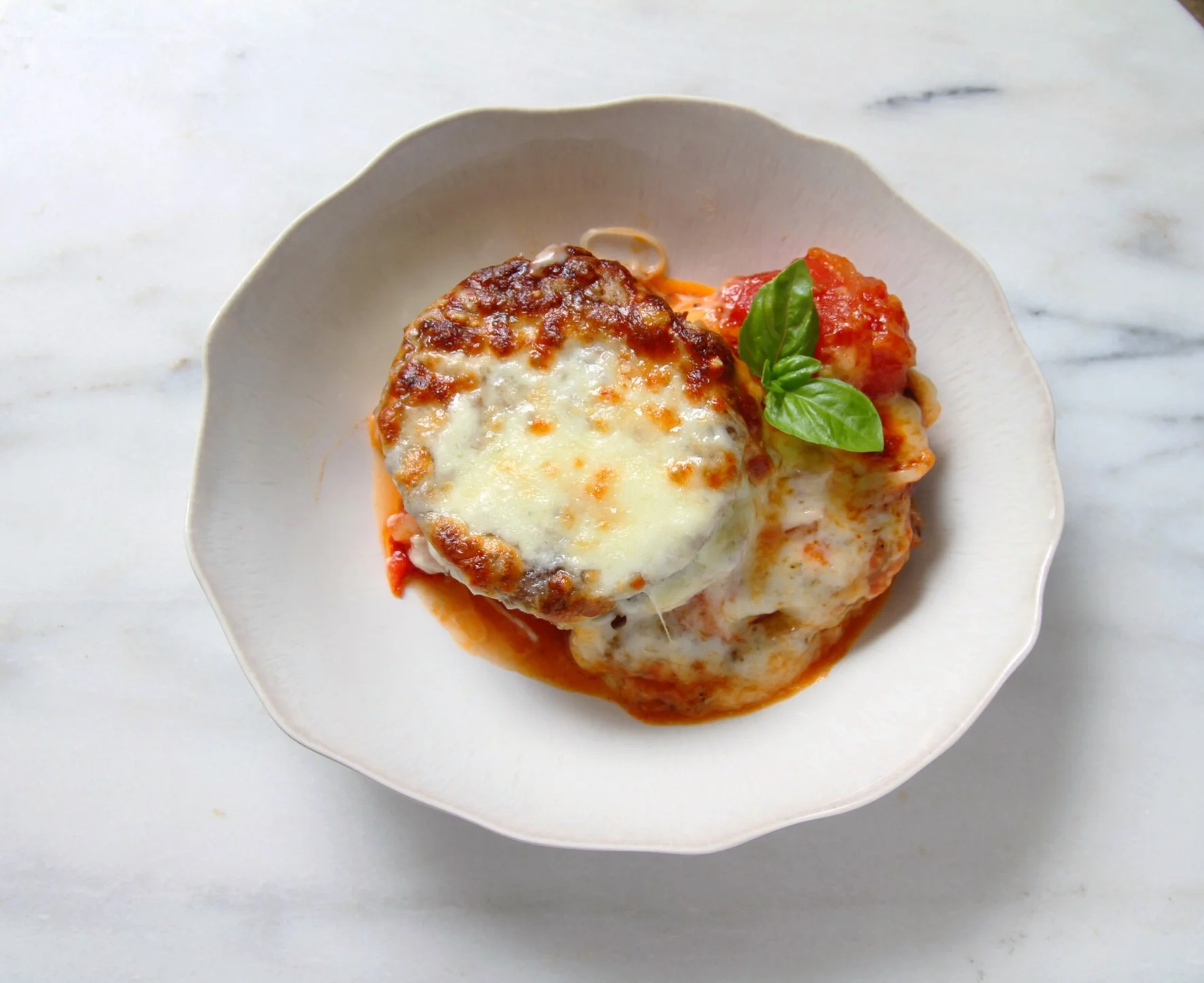 Eggplant Parmesan with homemade tomato sauce.