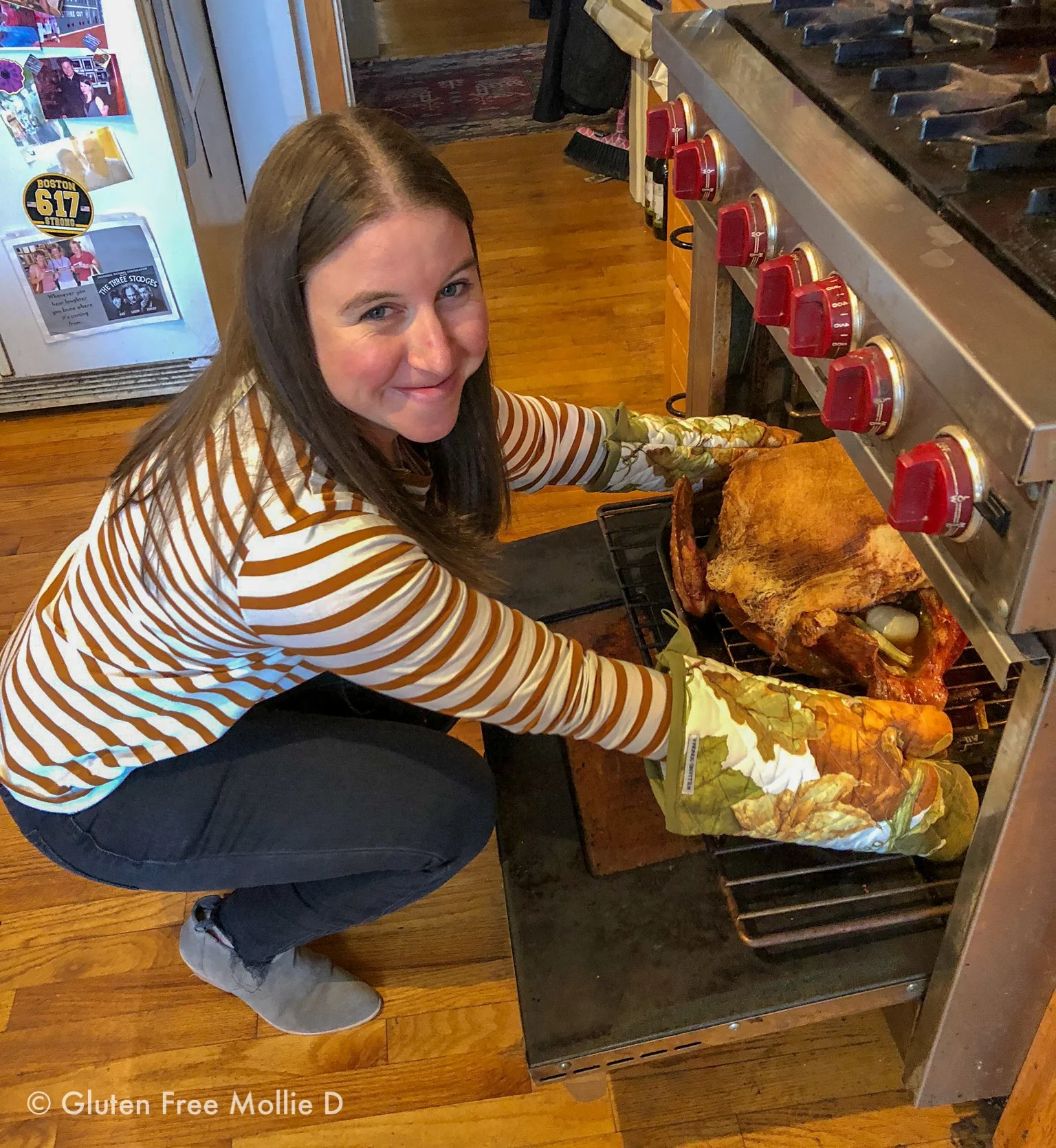 I always lift the turkey out of the oven. My official “job.”