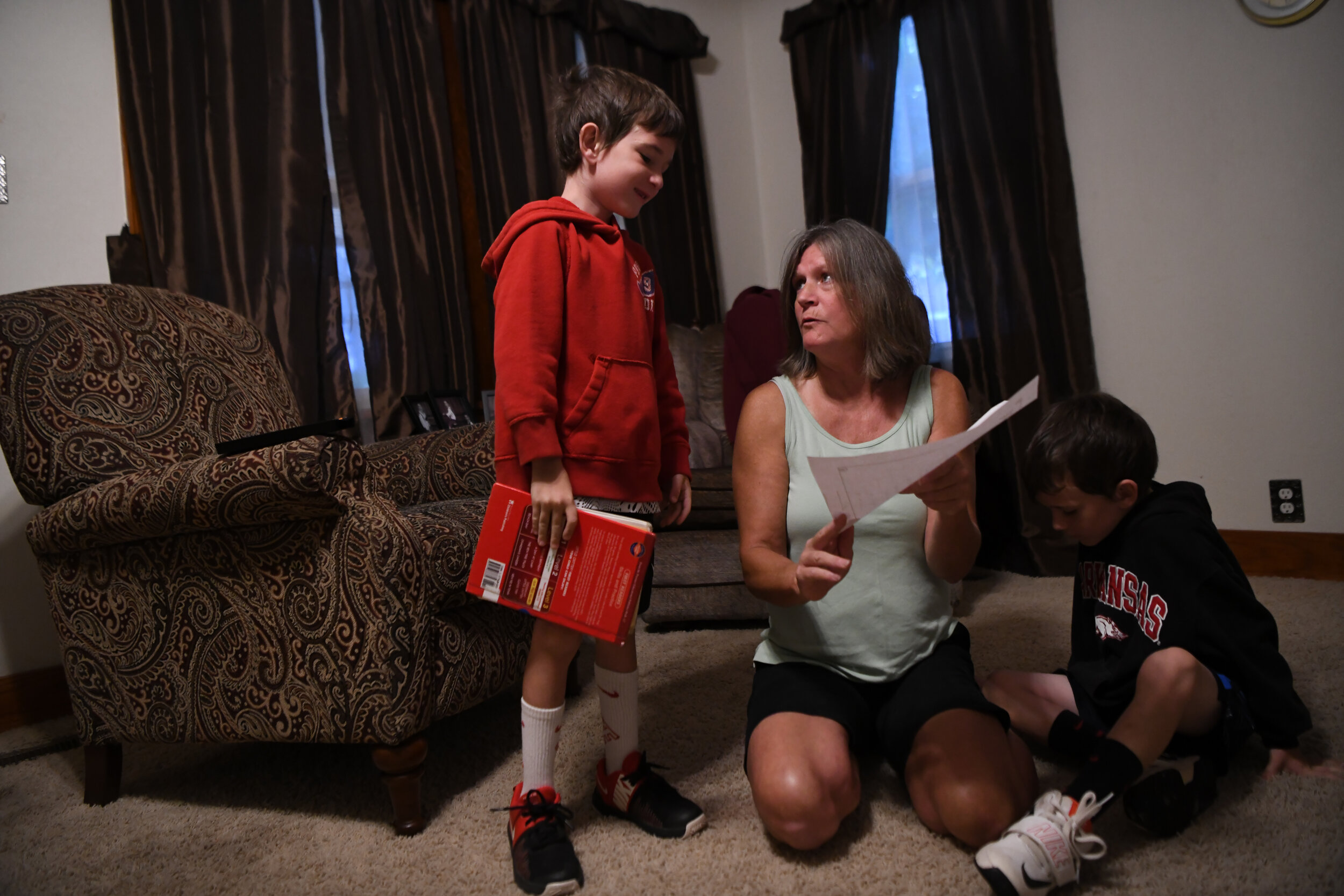  Schooldays begin early, and every morning Alice helps Riley (left) and Garrett (right) get ready for the day ahead. Alice had four of her own kids. But after her two sons died from suicide and a drug overdose in 2001 and 2004, the twins have brought